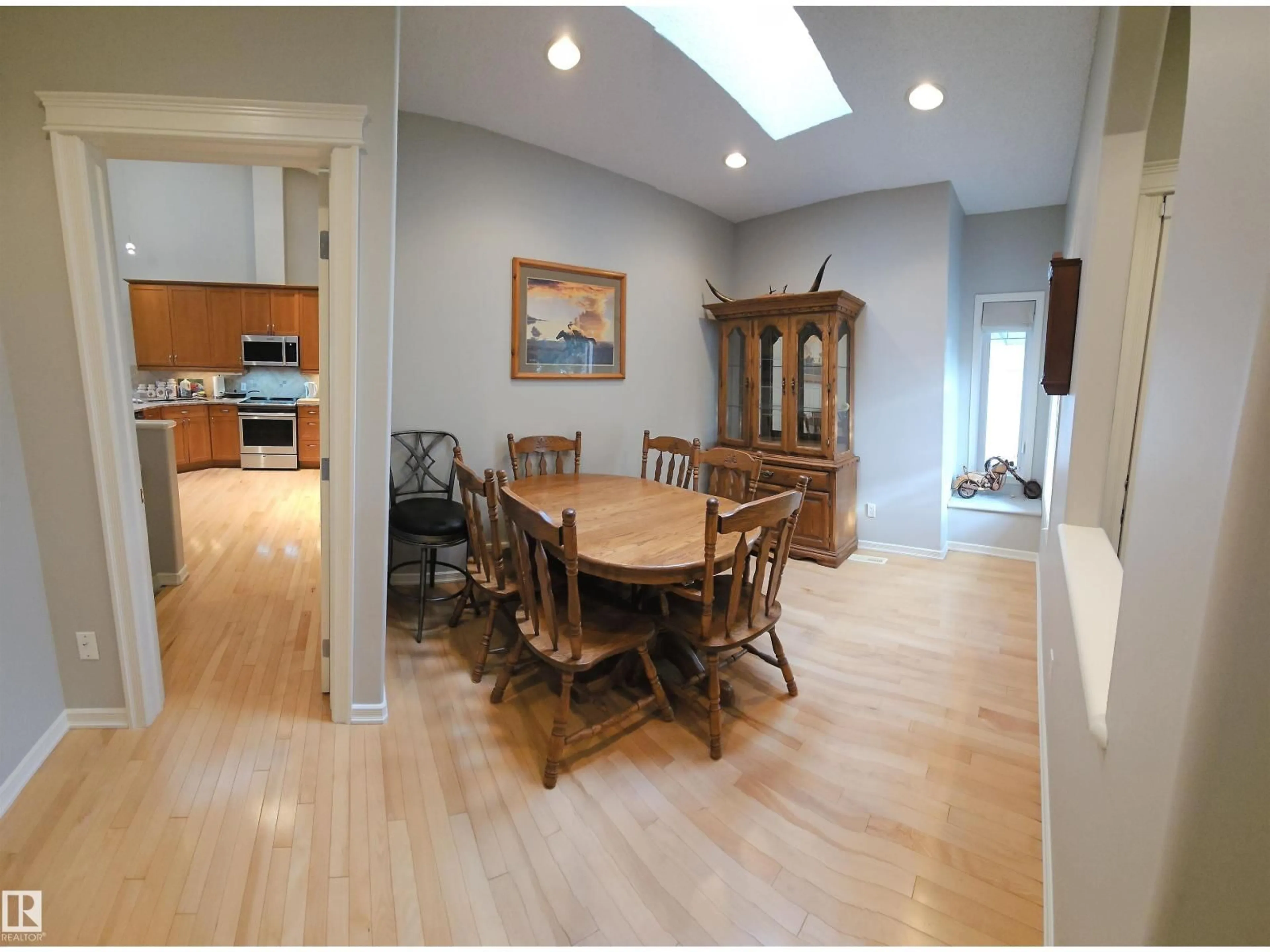 Dining room, wood/laminate floor for #36 - 3003 34 AV, Edmonton Alberta T6T0A1