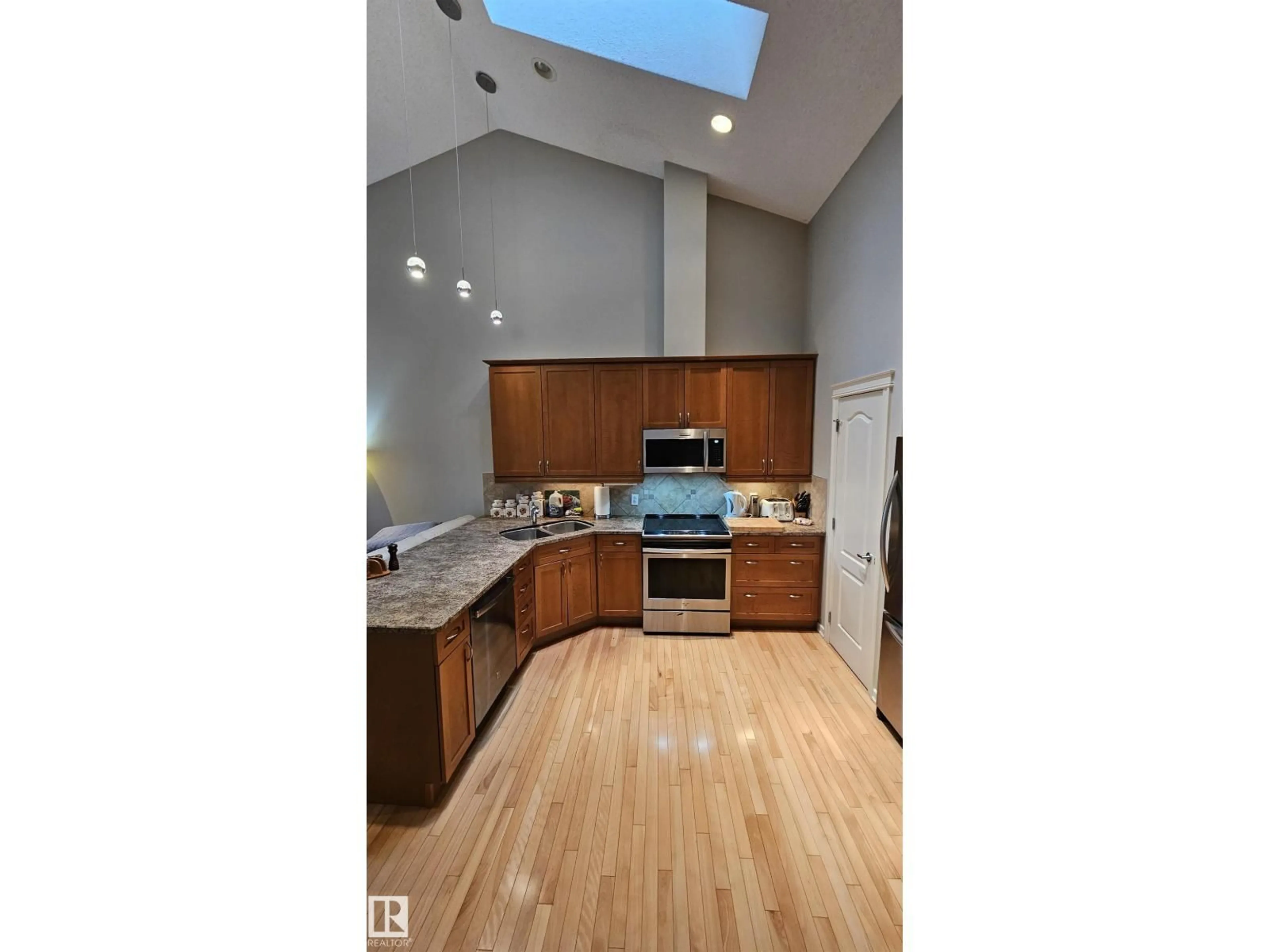 Open concept kitchen, unknown for #36 - 3003 34 AV, Edmonton Alberta T6T0A1