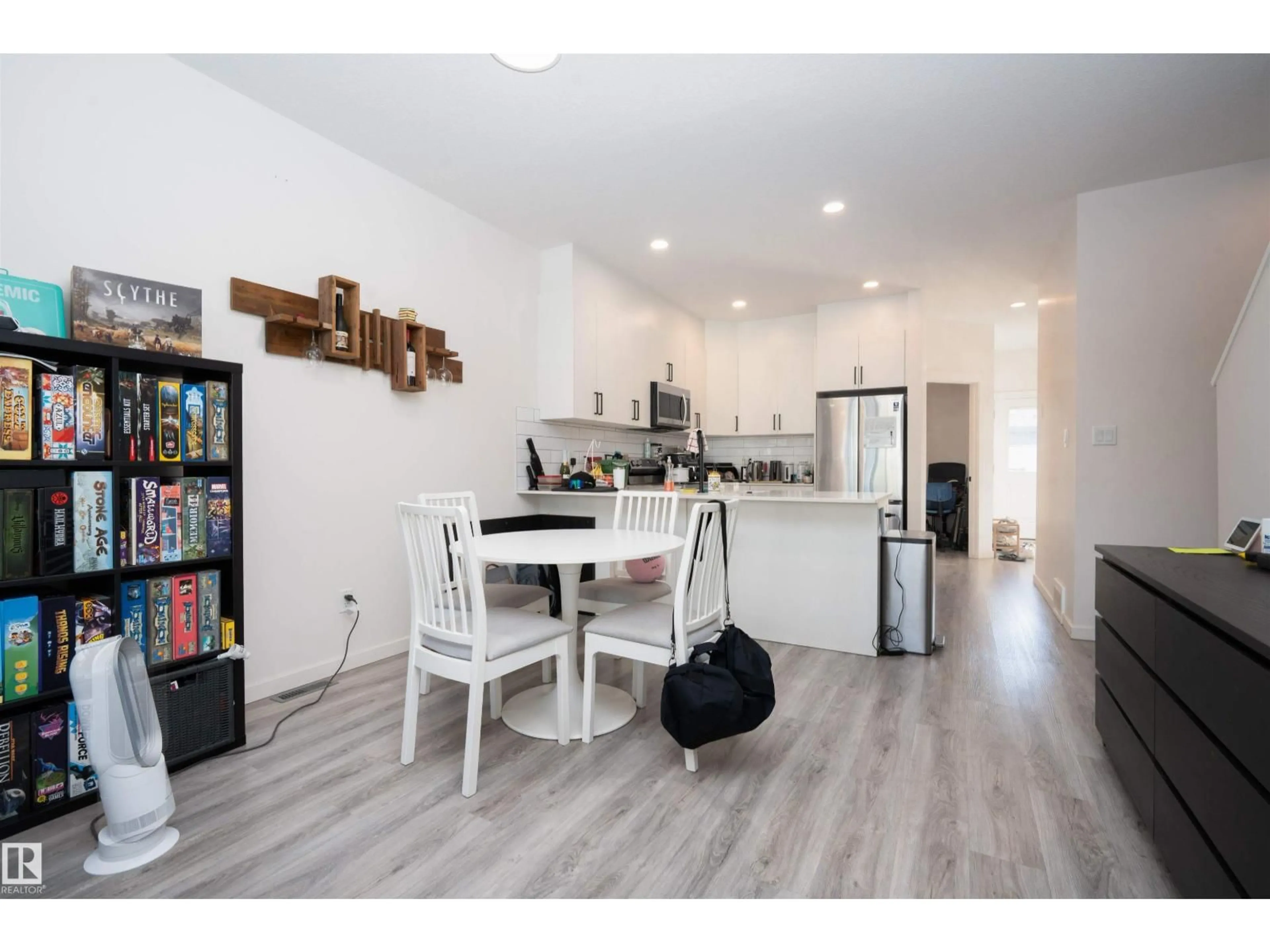 Open concept kitchen, wood/laminate floor for 1235 PODERSKY WD, Edmonton Alberta T6W4W3