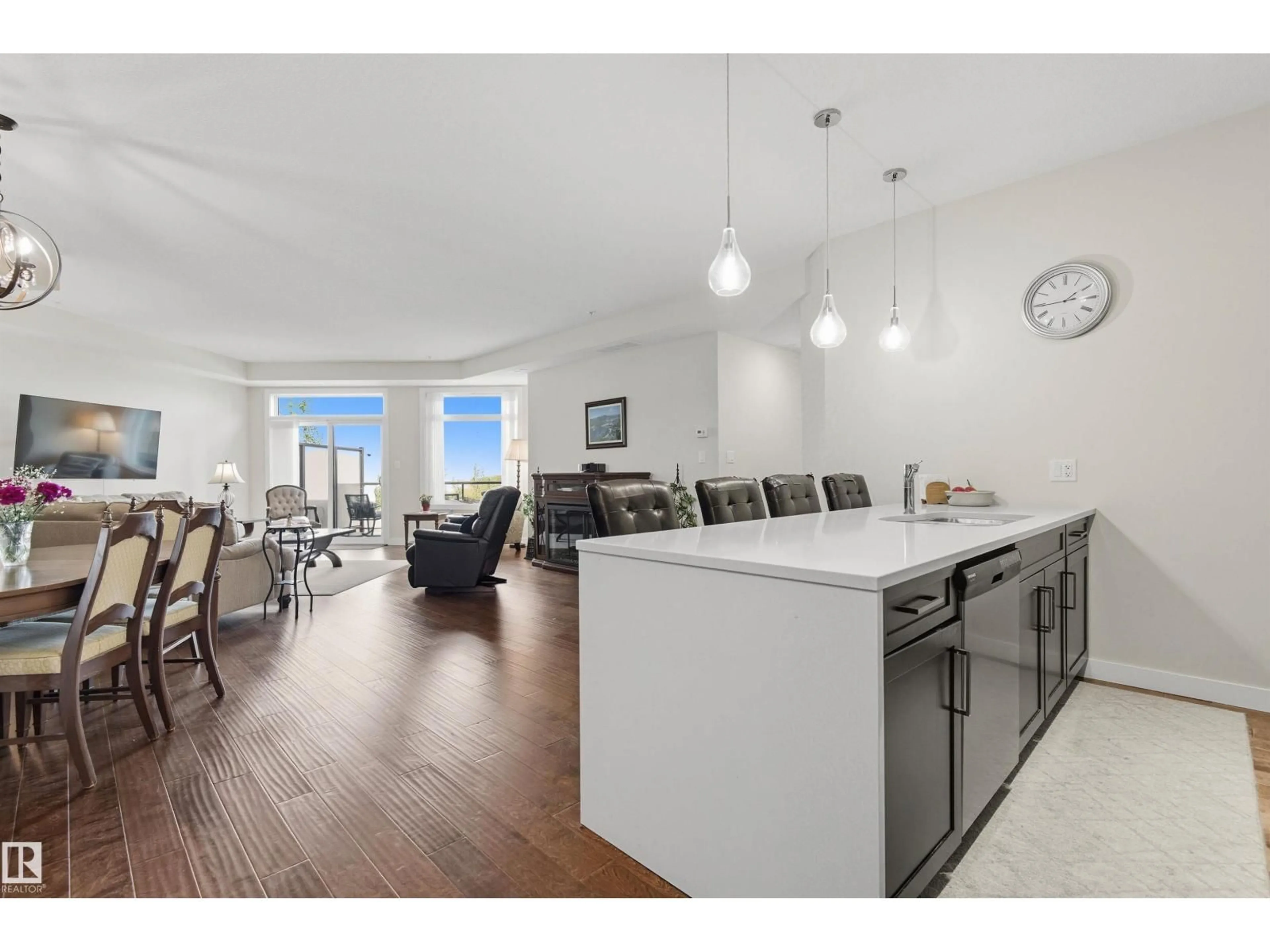 Open concept kitchen, wood/laminate floor for #414 - 625 LEGER WY, Edmonton Alberta T6R0W4