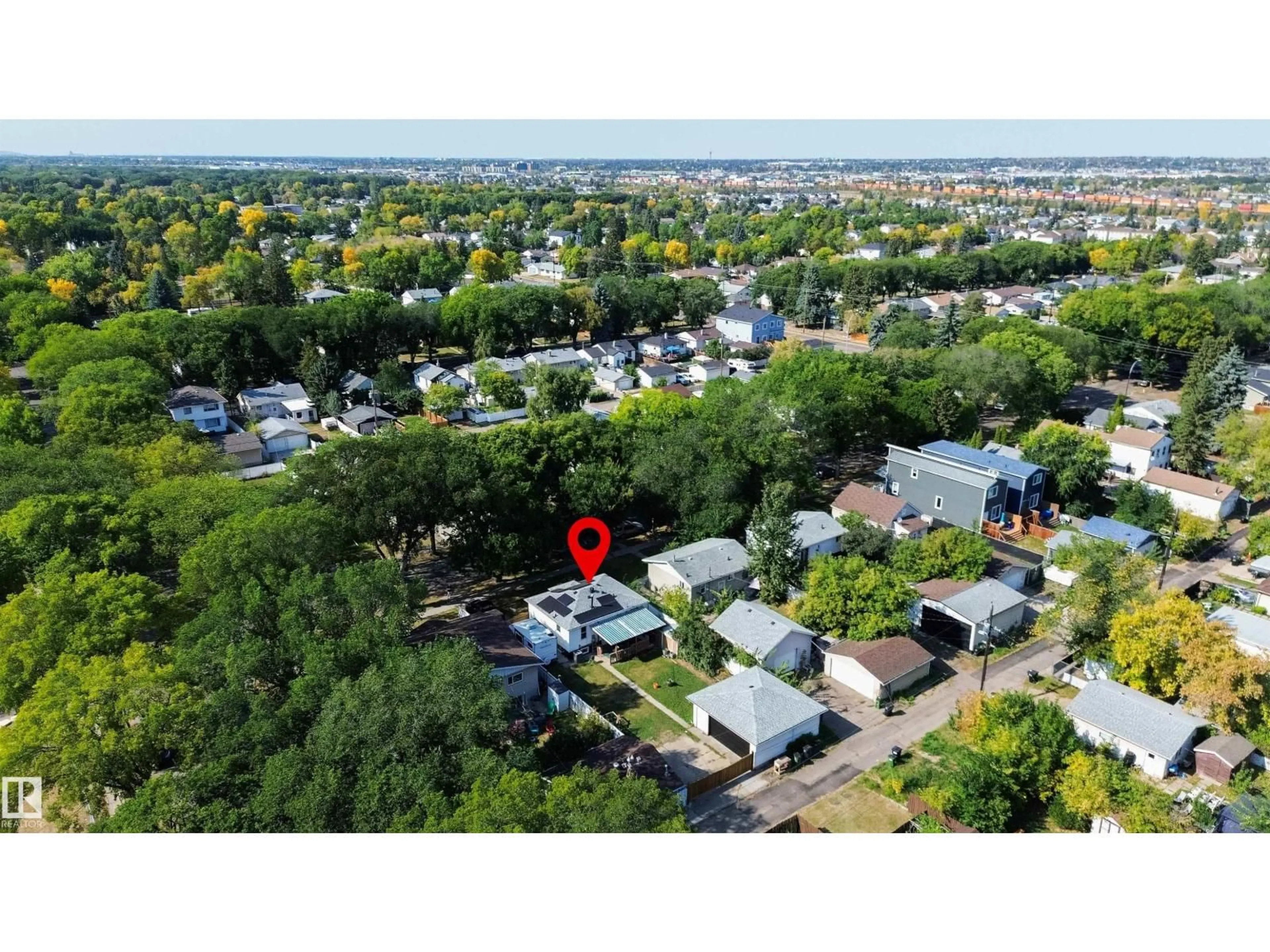 A pic from outside/outdoor area/front of a property/back of a property/a pic from drone, street for 12005 40 ST, Edmonton Alberta T5W2L2