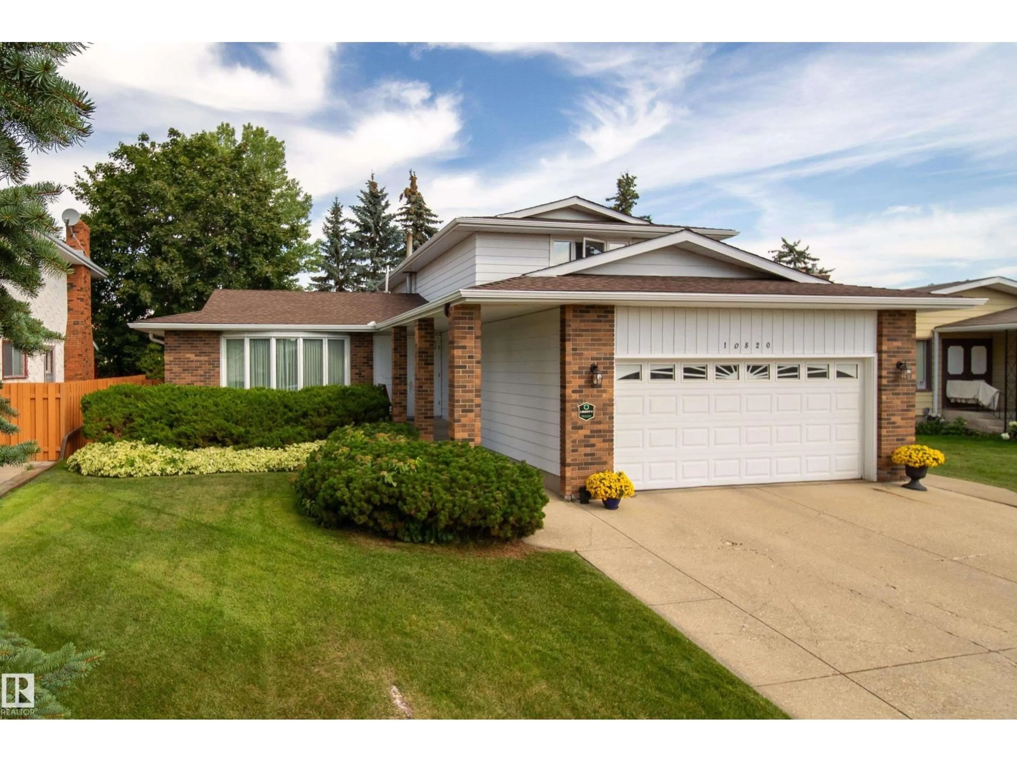 Home with brick exterior material, street for 10820 42A AV NW, Edmonton Alberta T6J2P7