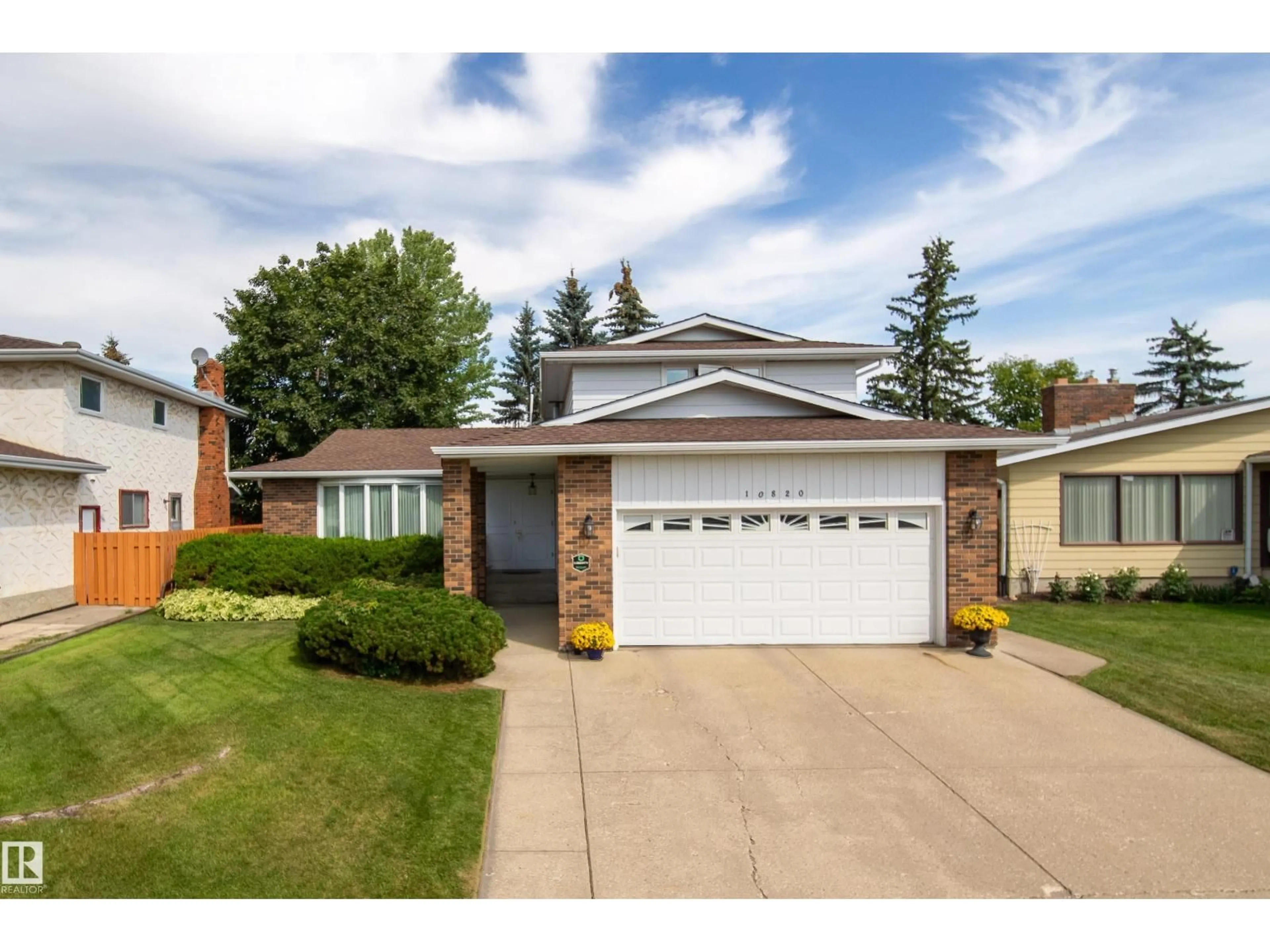 Home with brick exterior material, street for 10820 42A AV NW, Edmonton Alberta T6J2P7