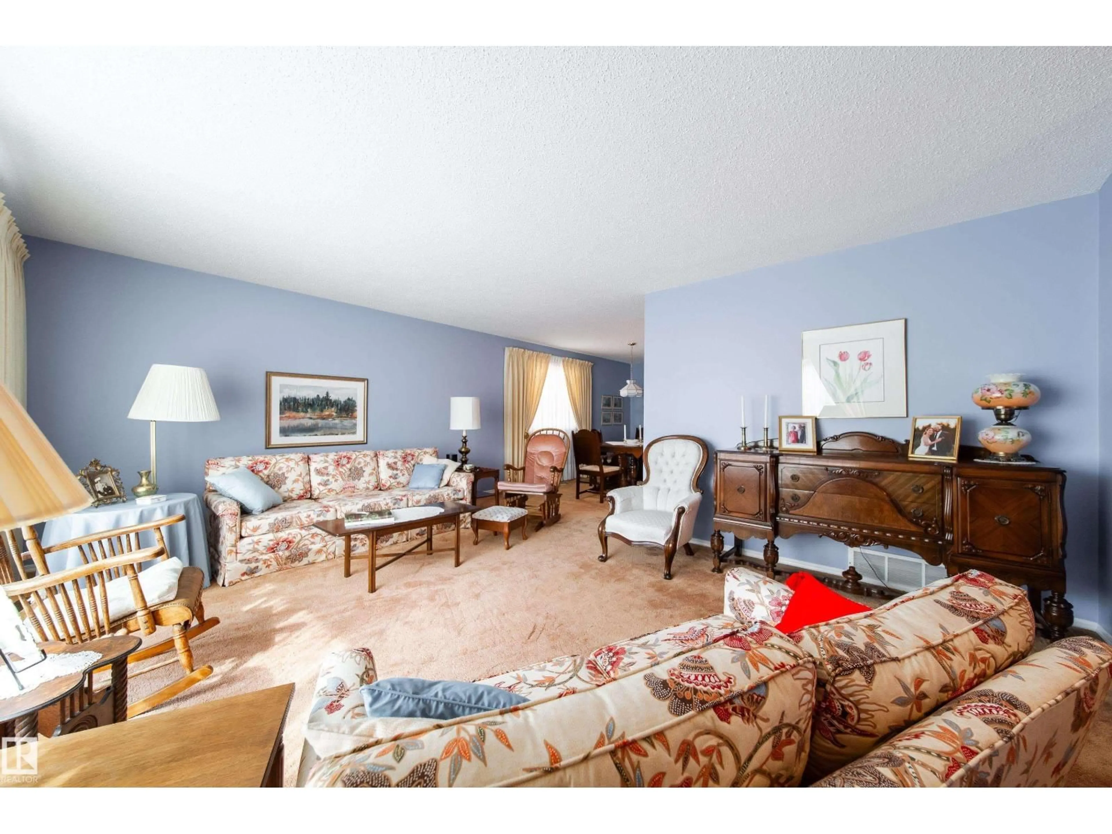 Living room with furniture, unknown for 10820 42A AV NW, Edmonton Alberta T6J2P7