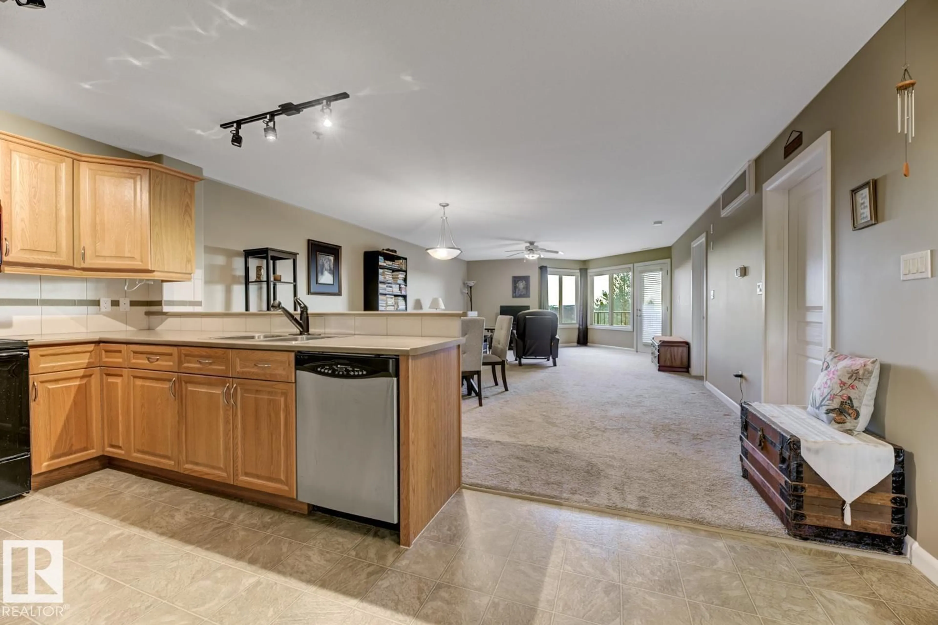 Open concept kitchen, ceramic/tile floor for #310 - 530 HOOKE RD, Edmonton Alberta T5A5J5