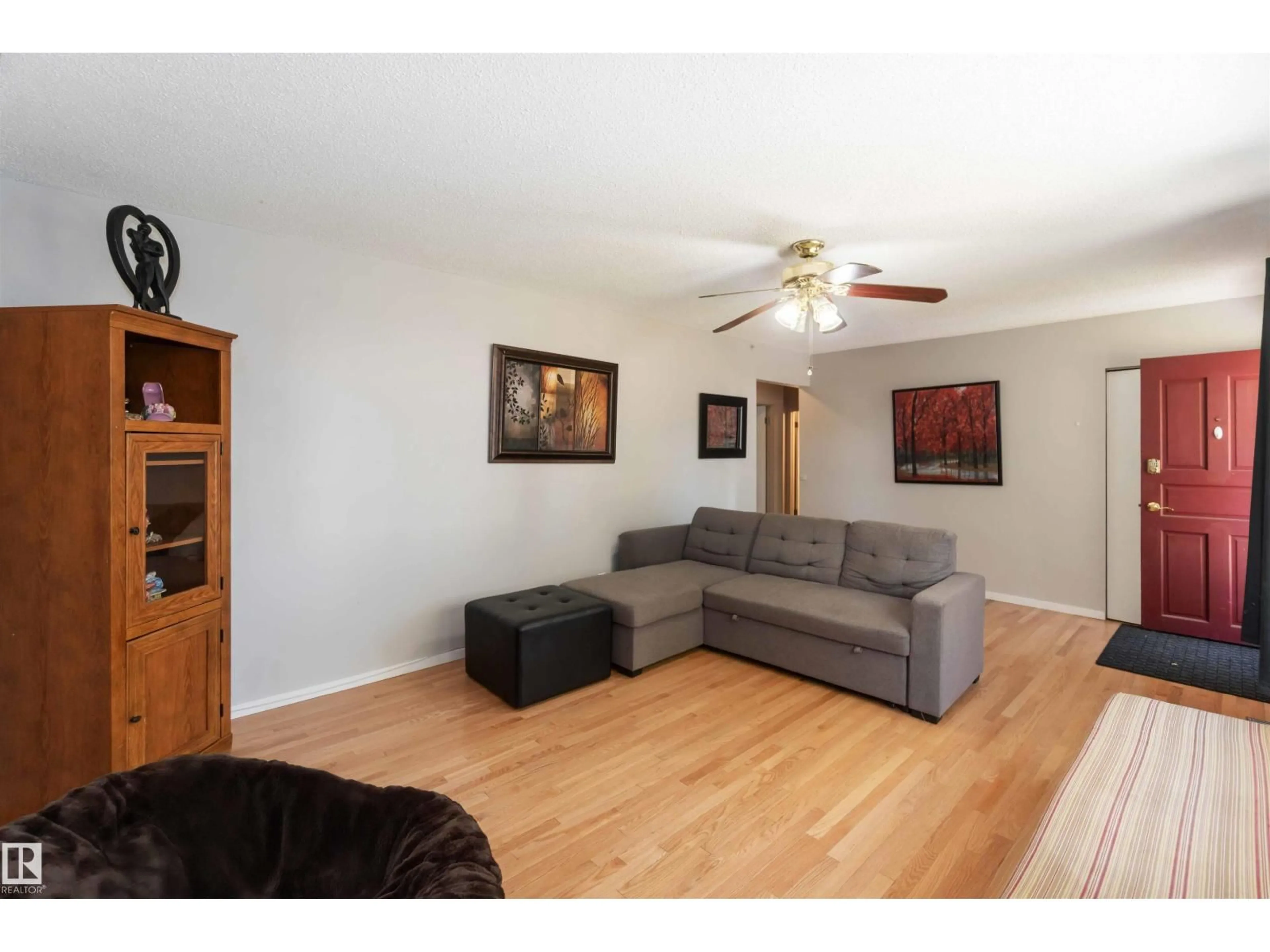 Living room with furniture, wood/laminate floor for NW - 13124 63 ST, Edmonton Alberta T5A0W8