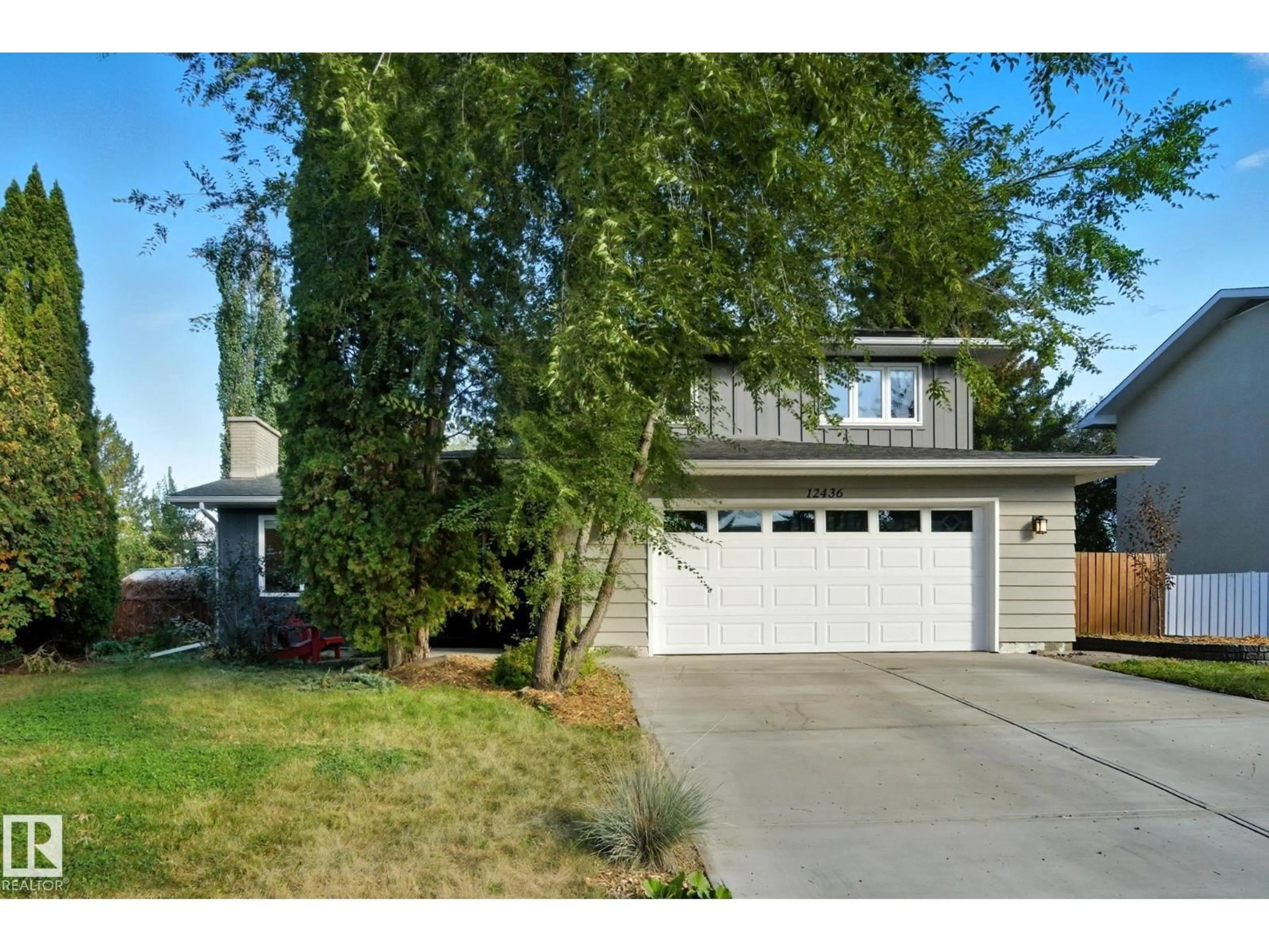 Home with vinyl exterior material, street for 12436 LANSDOWNE DR, Edmonton Alberta T6H4L5