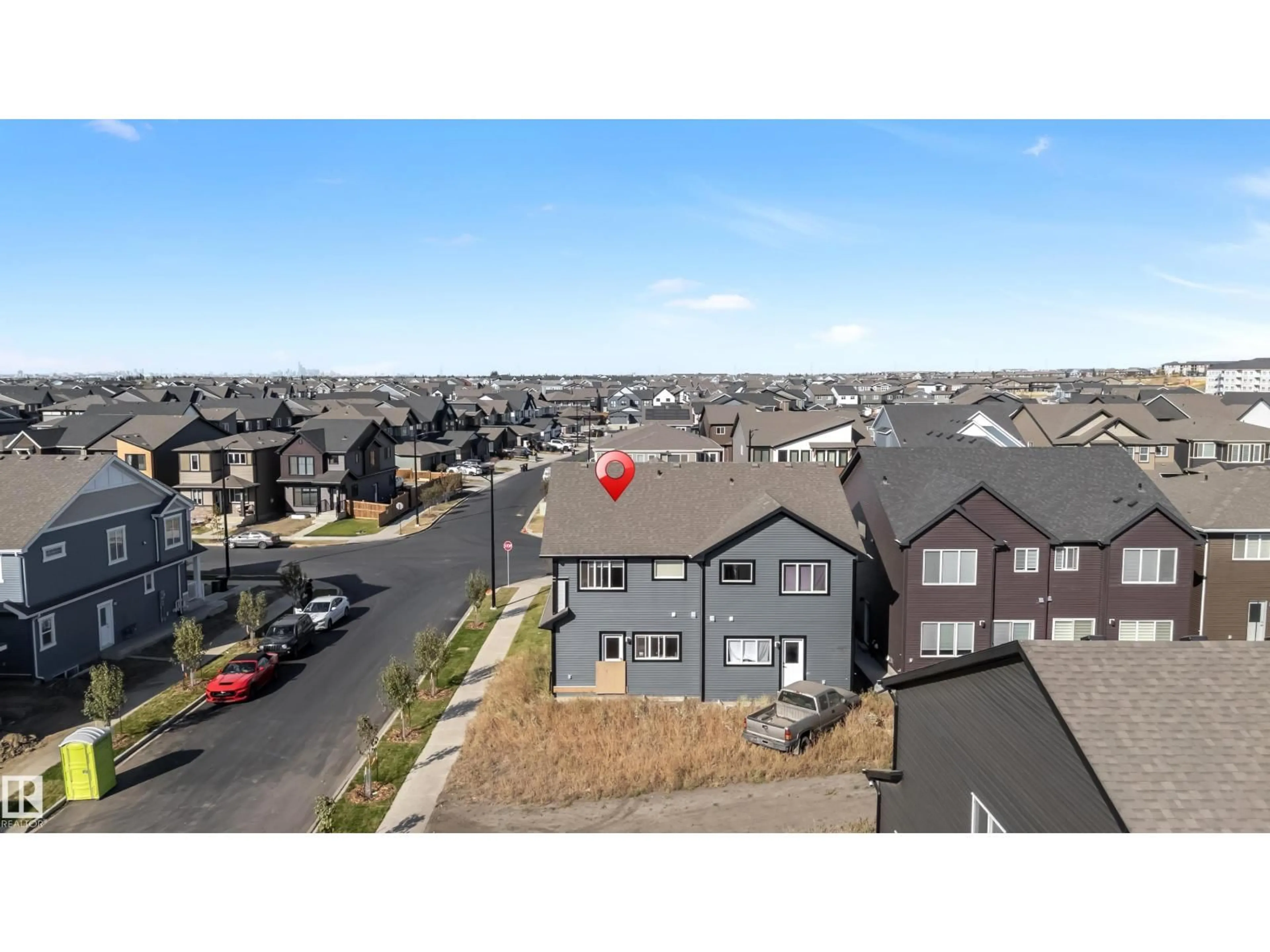 A pic from outside/outdoor area/front of a property/back of a property/a pic from drone, unknown for 232 ORCHARDS BV, Edmonton Alberta T6X2G9