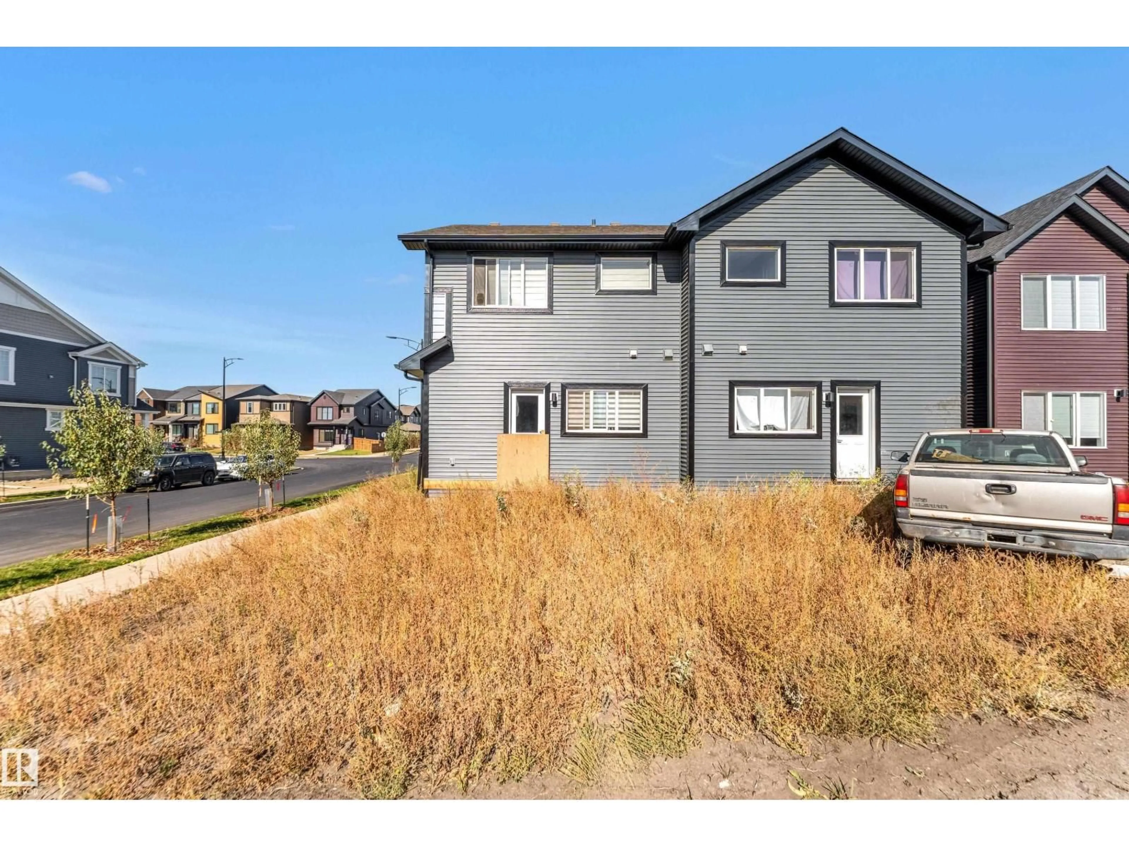Home with vinyl exterior material, street for 232 ORCHARDS BV, Edmonton Alberta T6X2G9