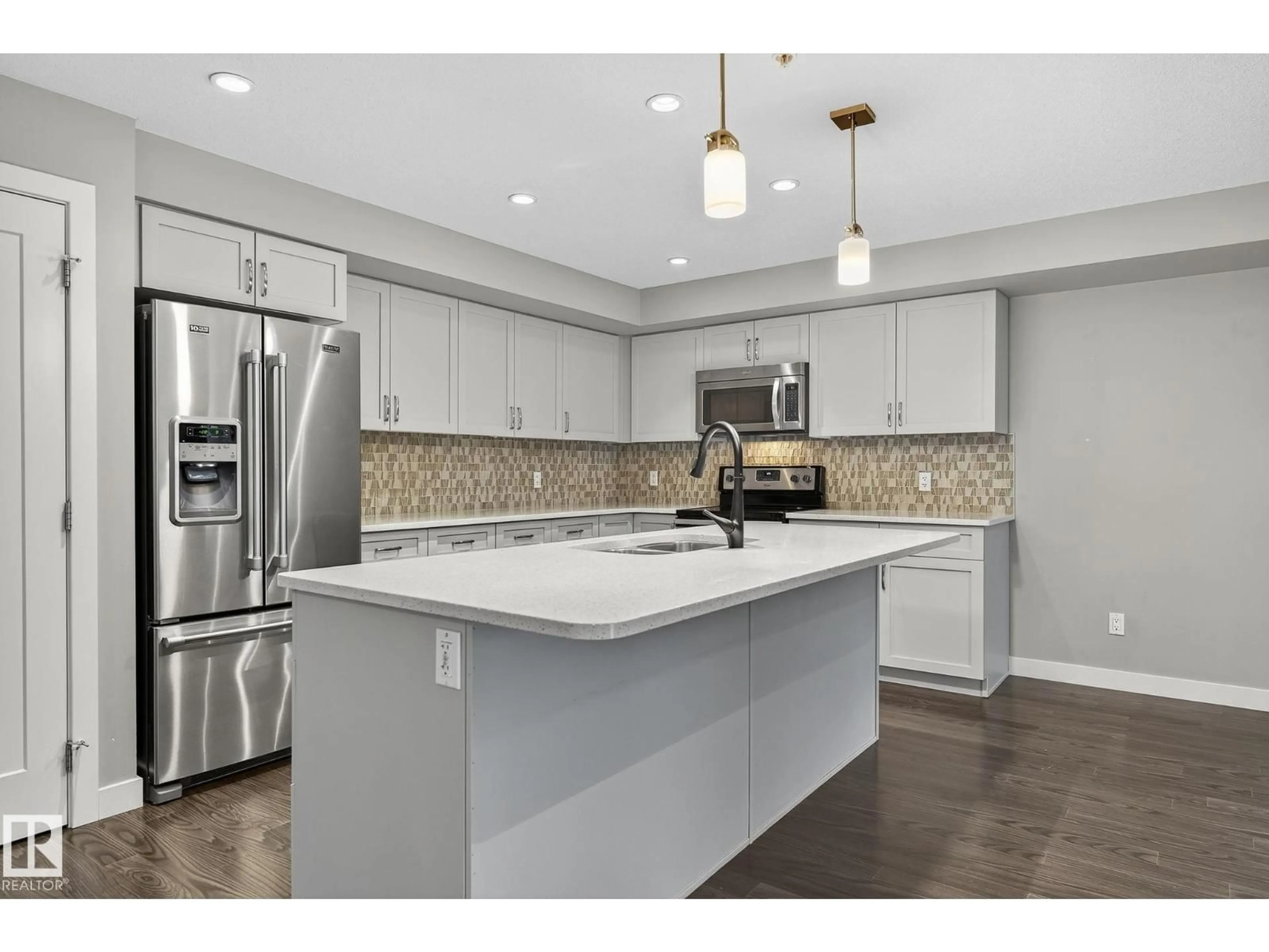 Open concept kitchen, unknown for #102 - 5029 EDGEMONT BV, Edmonton Alberta T6M0S8