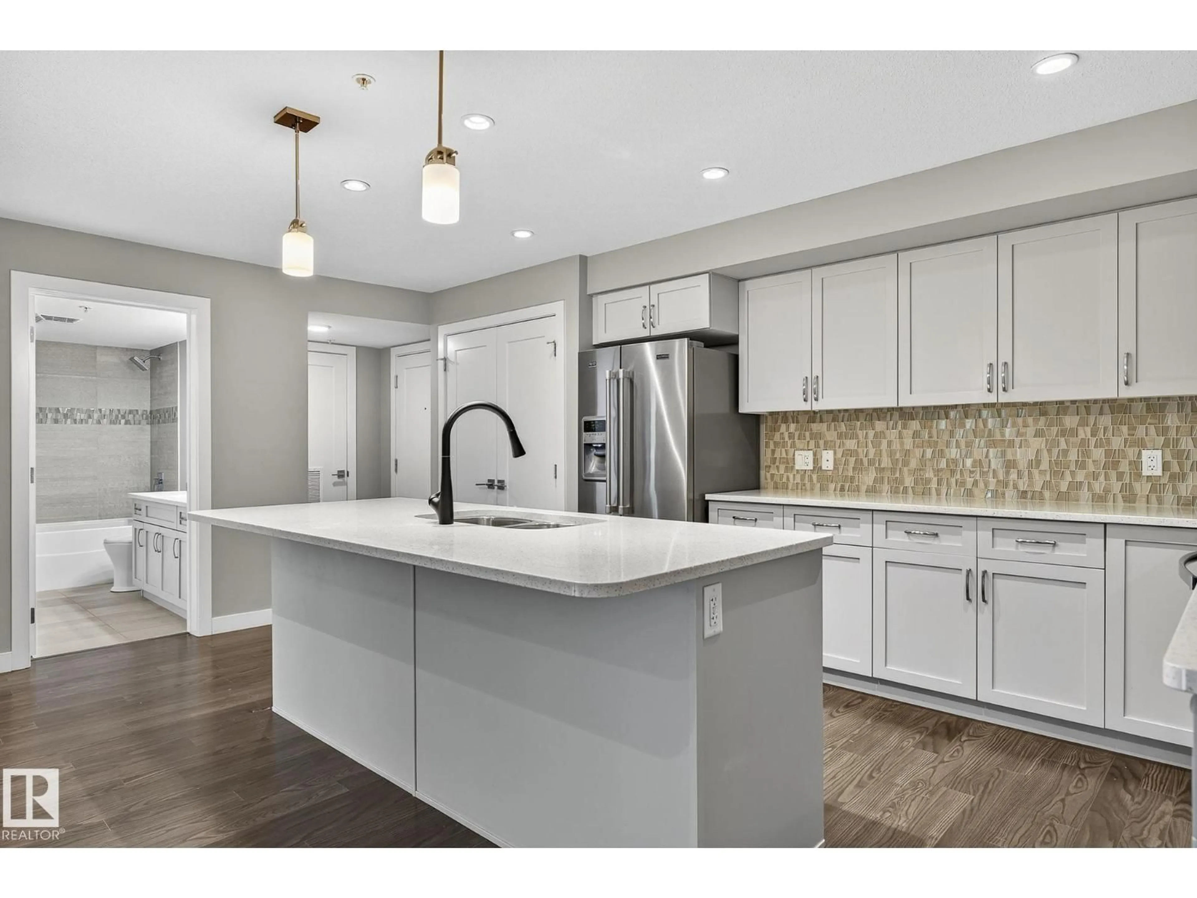 Open concept kitchen, unknown for #102 - 5029 EDGEMONT BV, Edmonton Alberta T6M0S8