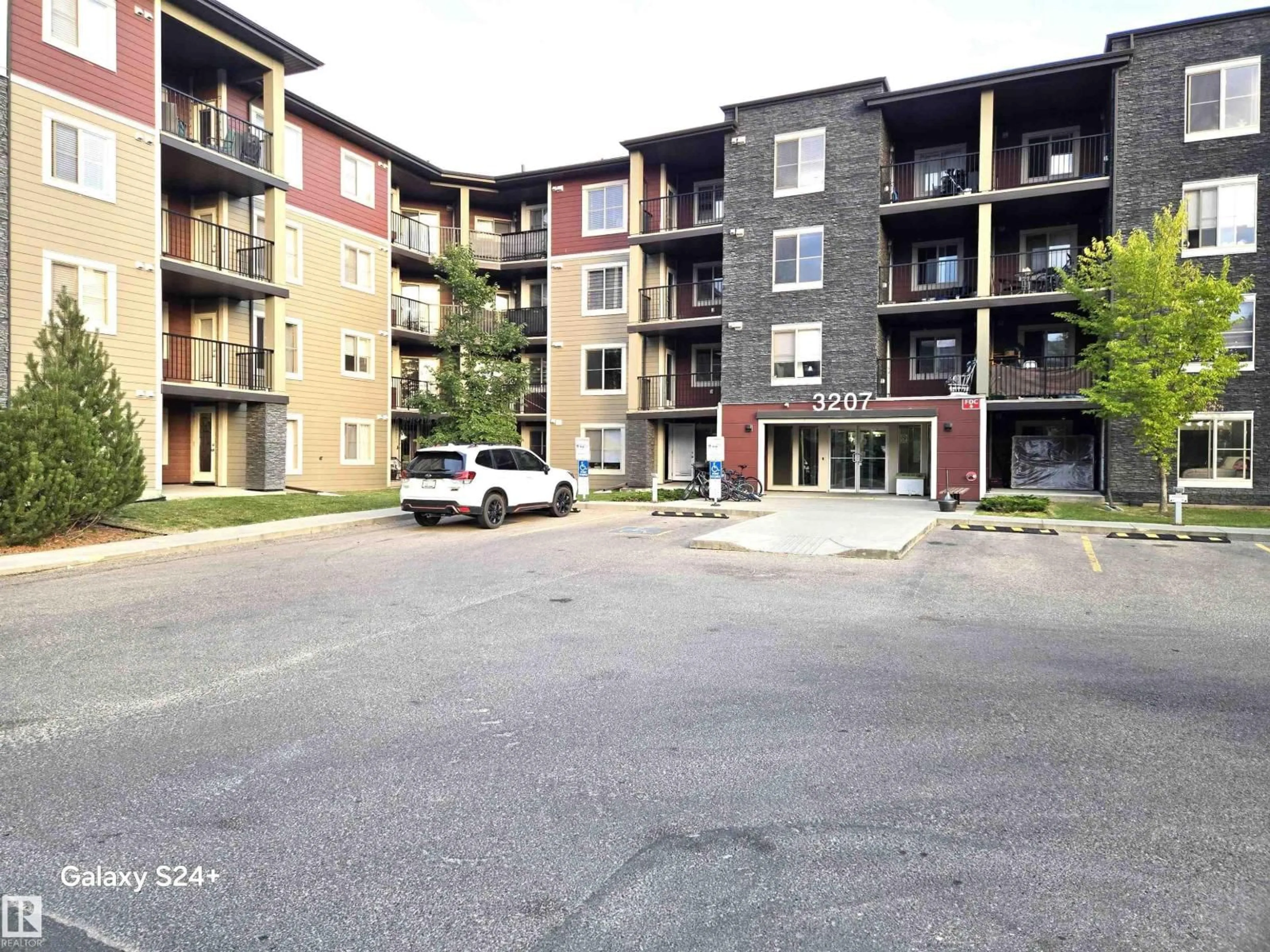 A pic from outside/outdoor area/front of a property/back of a property/a pic from drone, street for 210 - 3207 JAMES MOWATT TR, Edmonton Alberta T6W3L6
