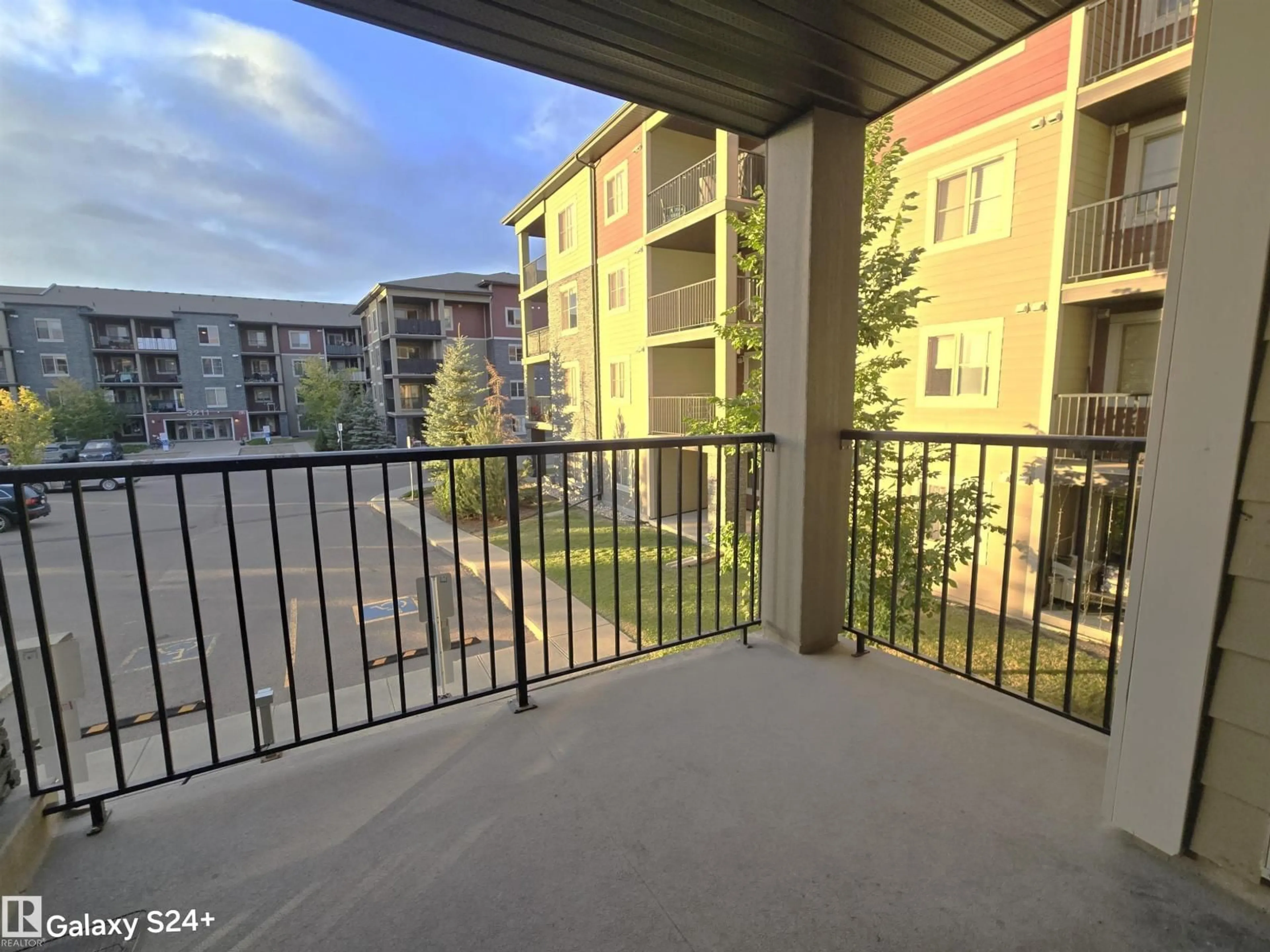 Balcony in the apartment, city buildings view from balcony for 210 - 3207 JAMES MOWATT TR, Edmonton Alberta T6W3L6