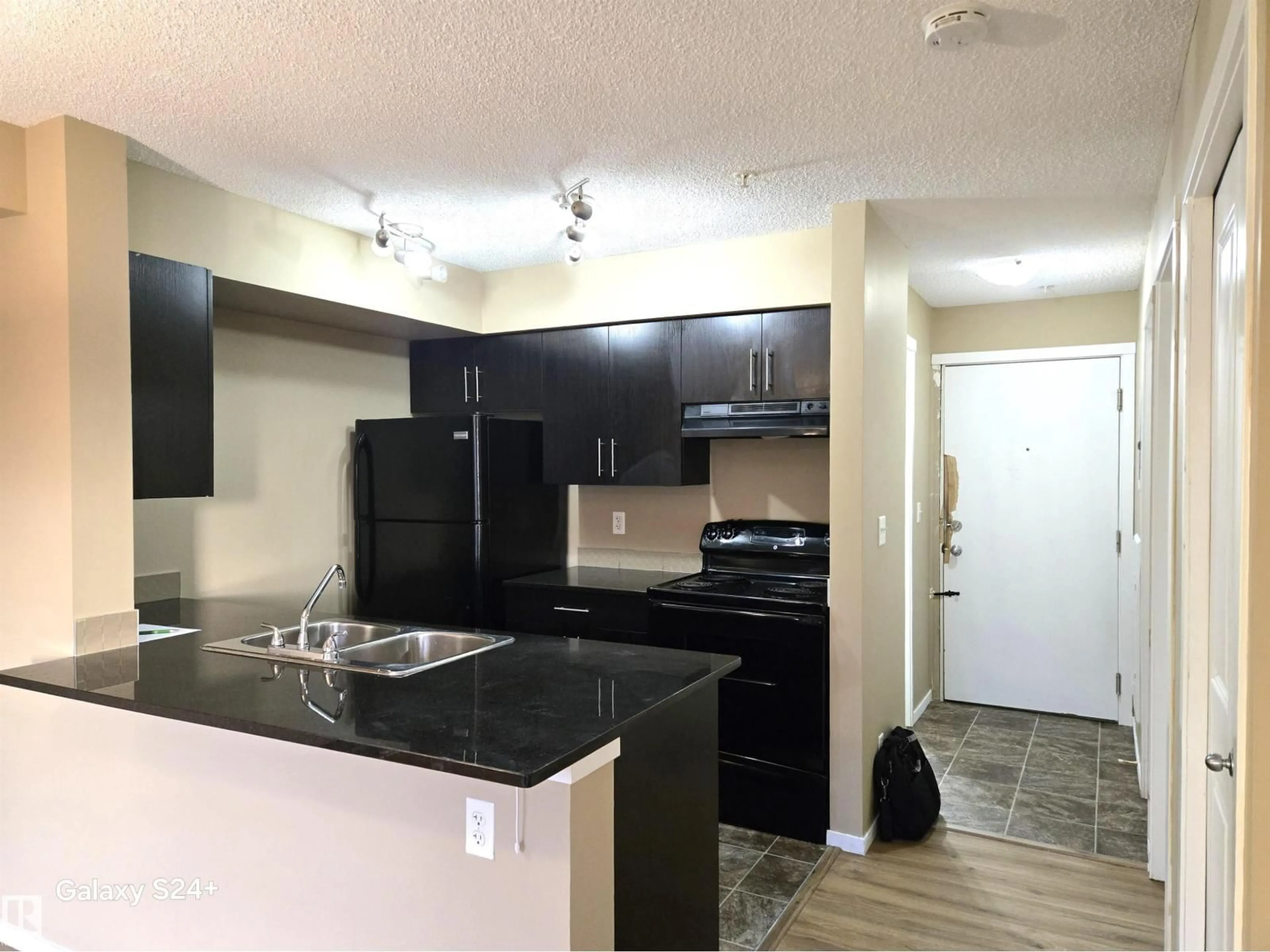 Standard kitchen, unknown for 210 - 3207 JAMES MOWATT TR, Edmonton Alberta T6W3L6