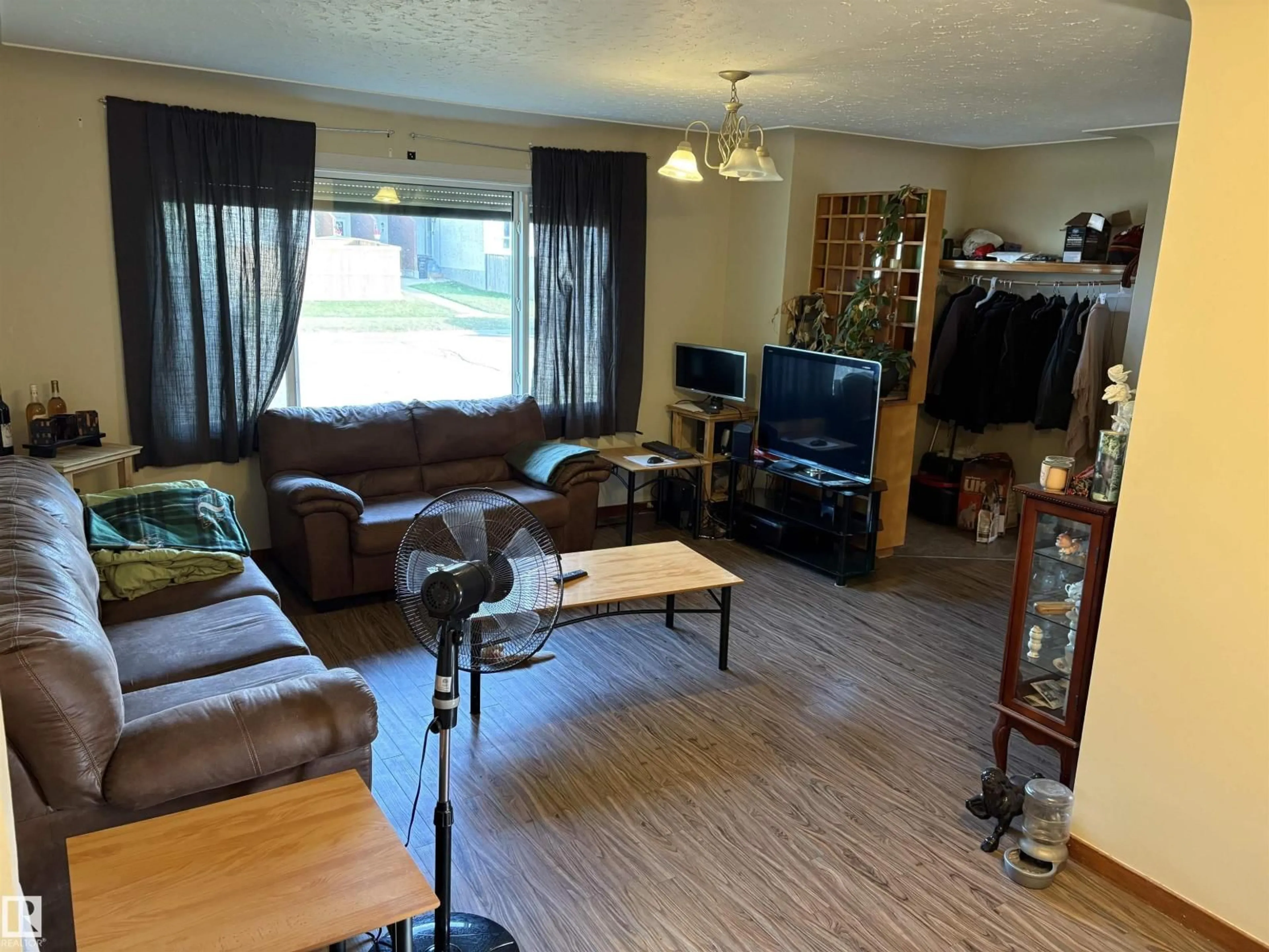 Living room with furniture, wood/laminate floor for 4840 50 ST, Gibbons Alberta T0A1N0