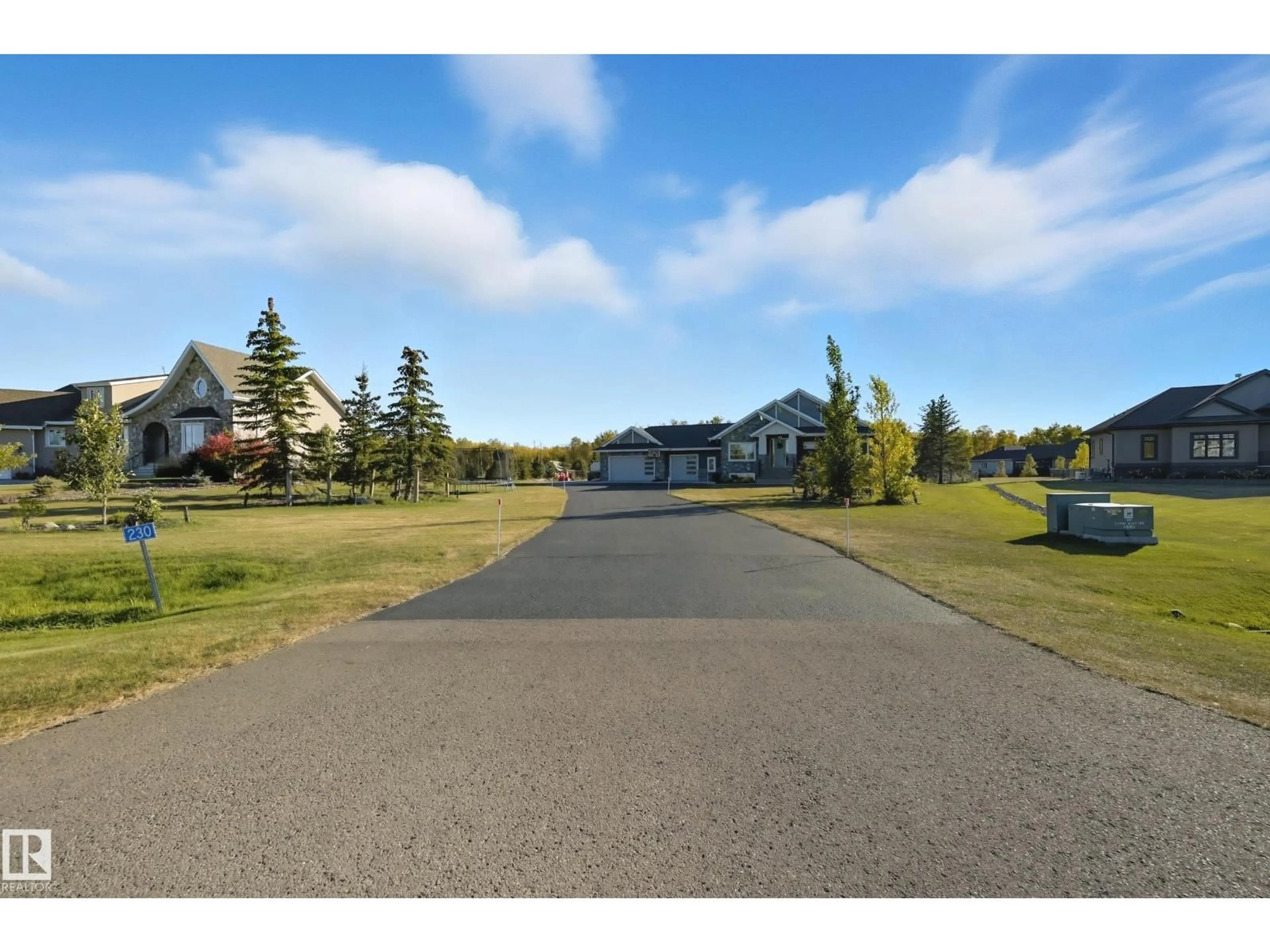 A pic from outside/outdoor area/front of a property/back of a property/a pic from drone, street for 230 50516 RANGE ROAD, Rural Leduc County Alberta T4X0L4