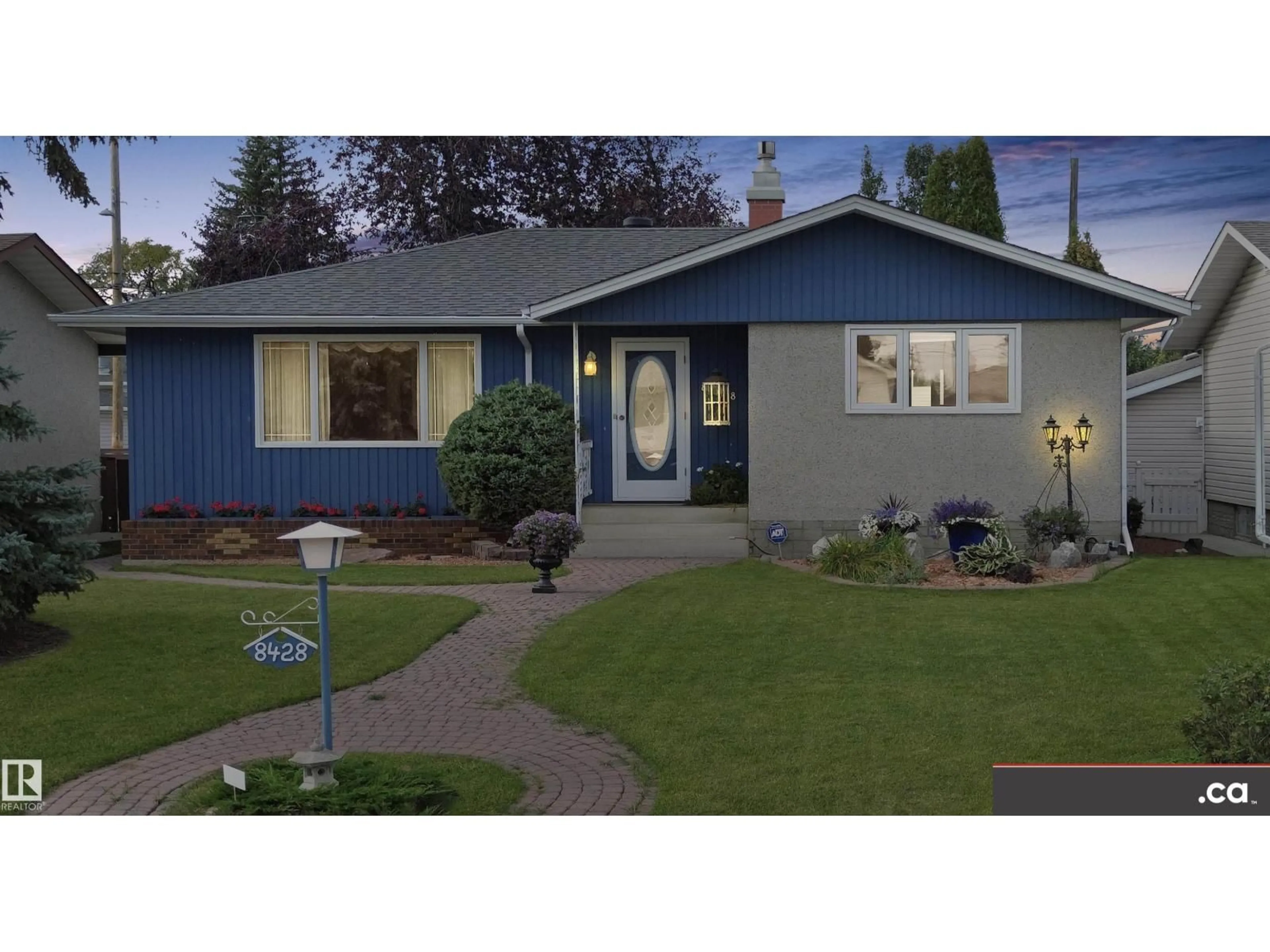 Home with vinyl exterior material, street for NW - 8428 54 ST, Edmonton Alberta T6B1H1