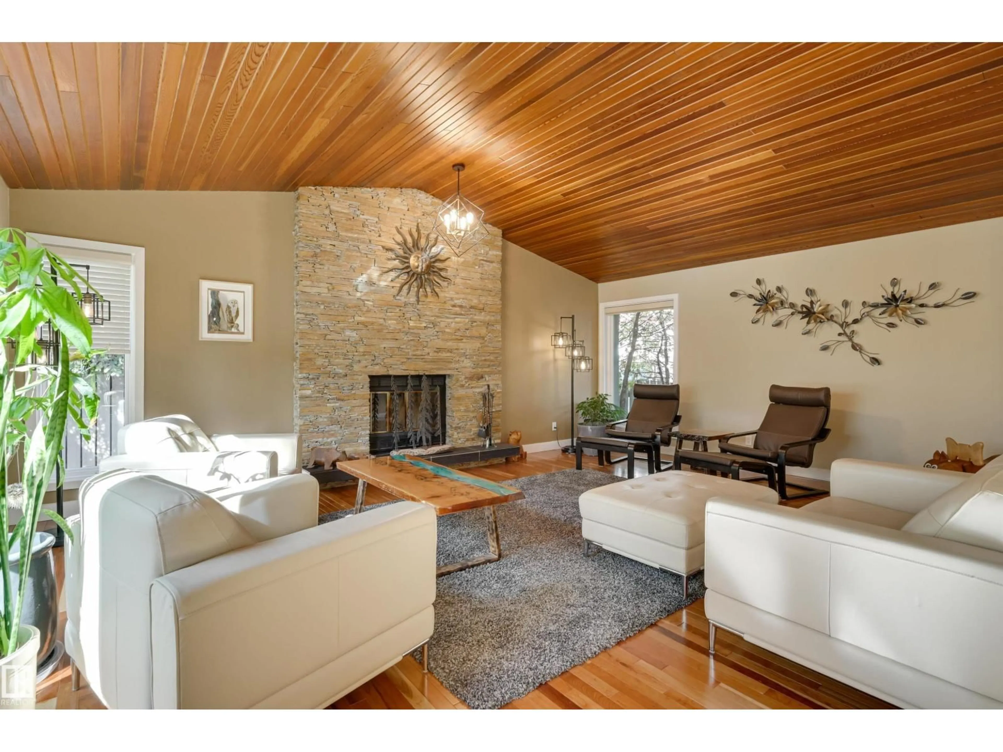 Living room with furniture, wood/laminate floor for 17623 53 AV, Edmonton Alberta T6G1M4