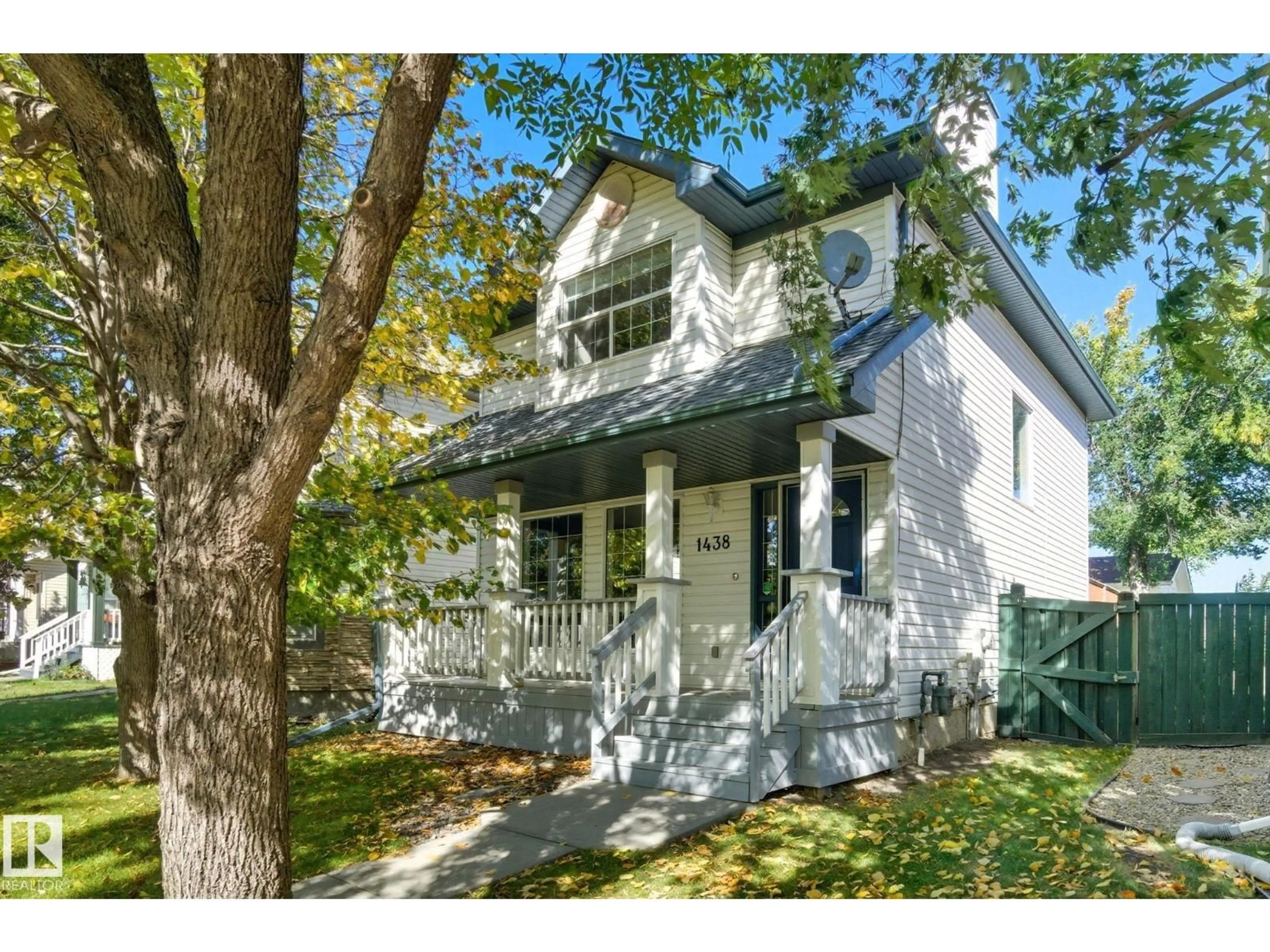 Home with vinyl exterior material, street for 1438 GRANT WY, Edmonton Alberta T5T6L3