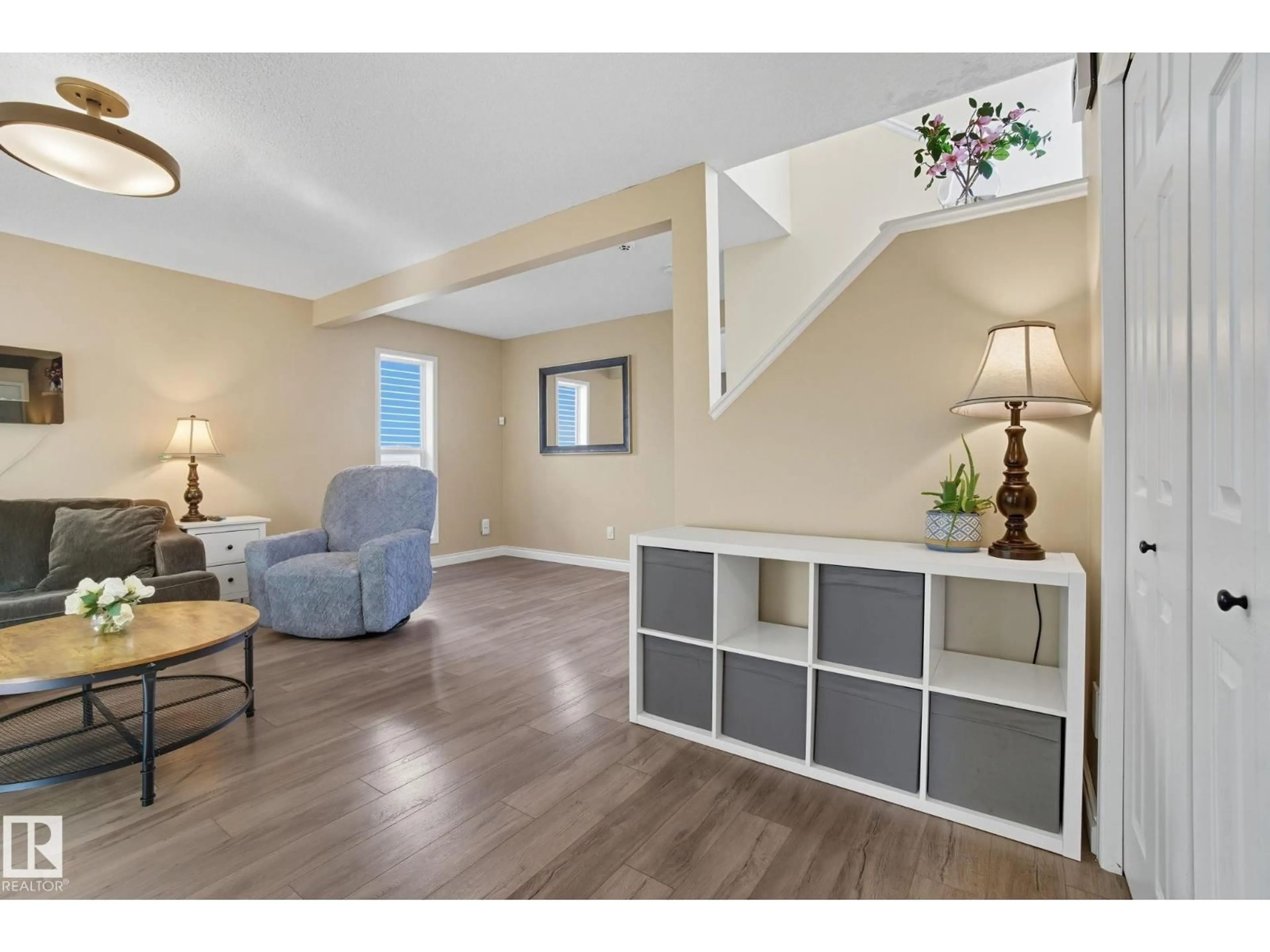 Living room with furniture, wood/laminate floor for 1438 GRANT WY, Edmonton Alberta T5T6L3