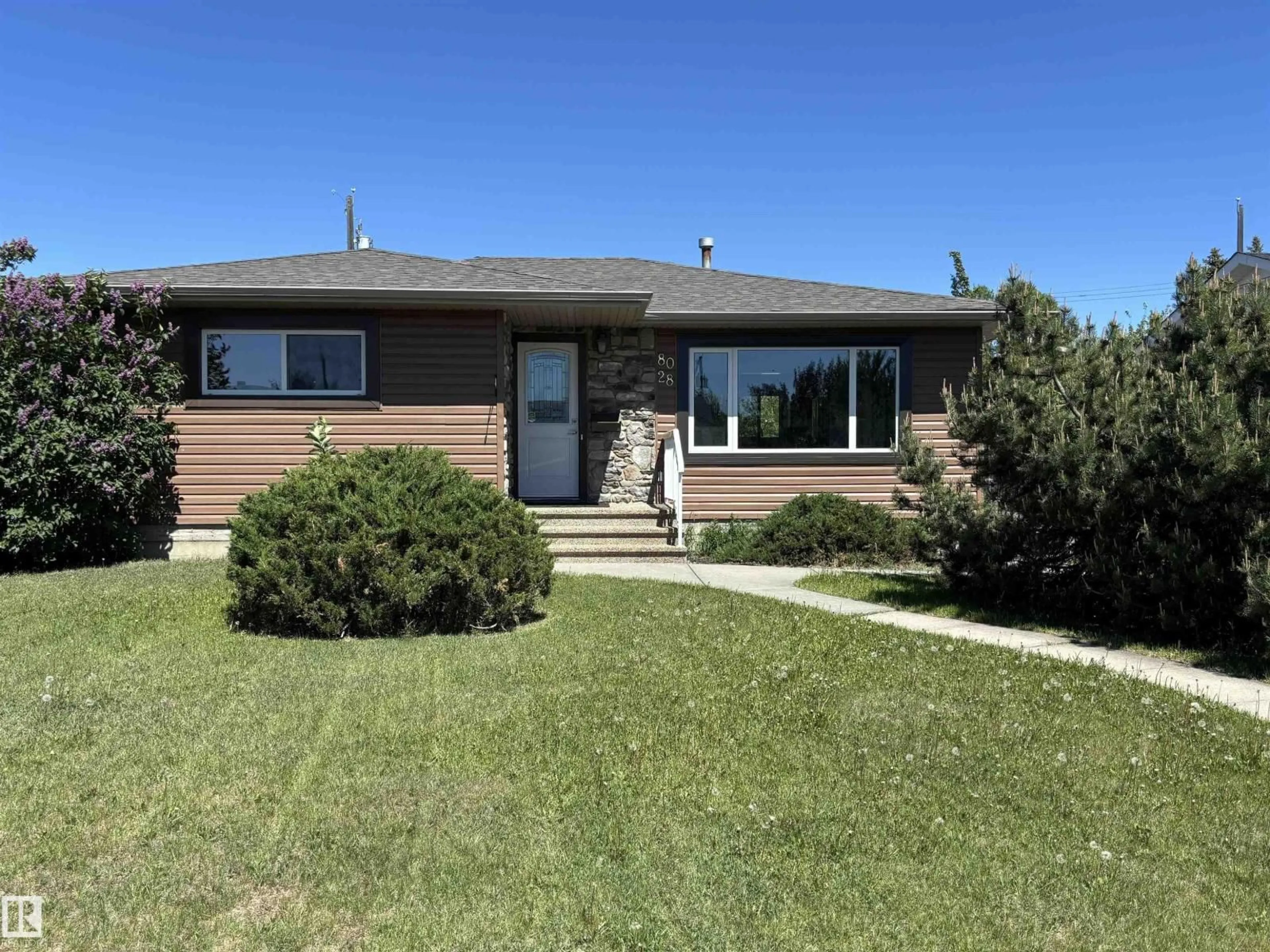 Home with vinyl exterior material, street for NW - 8028 134A AV, Edmonton Alberta T5C2G9