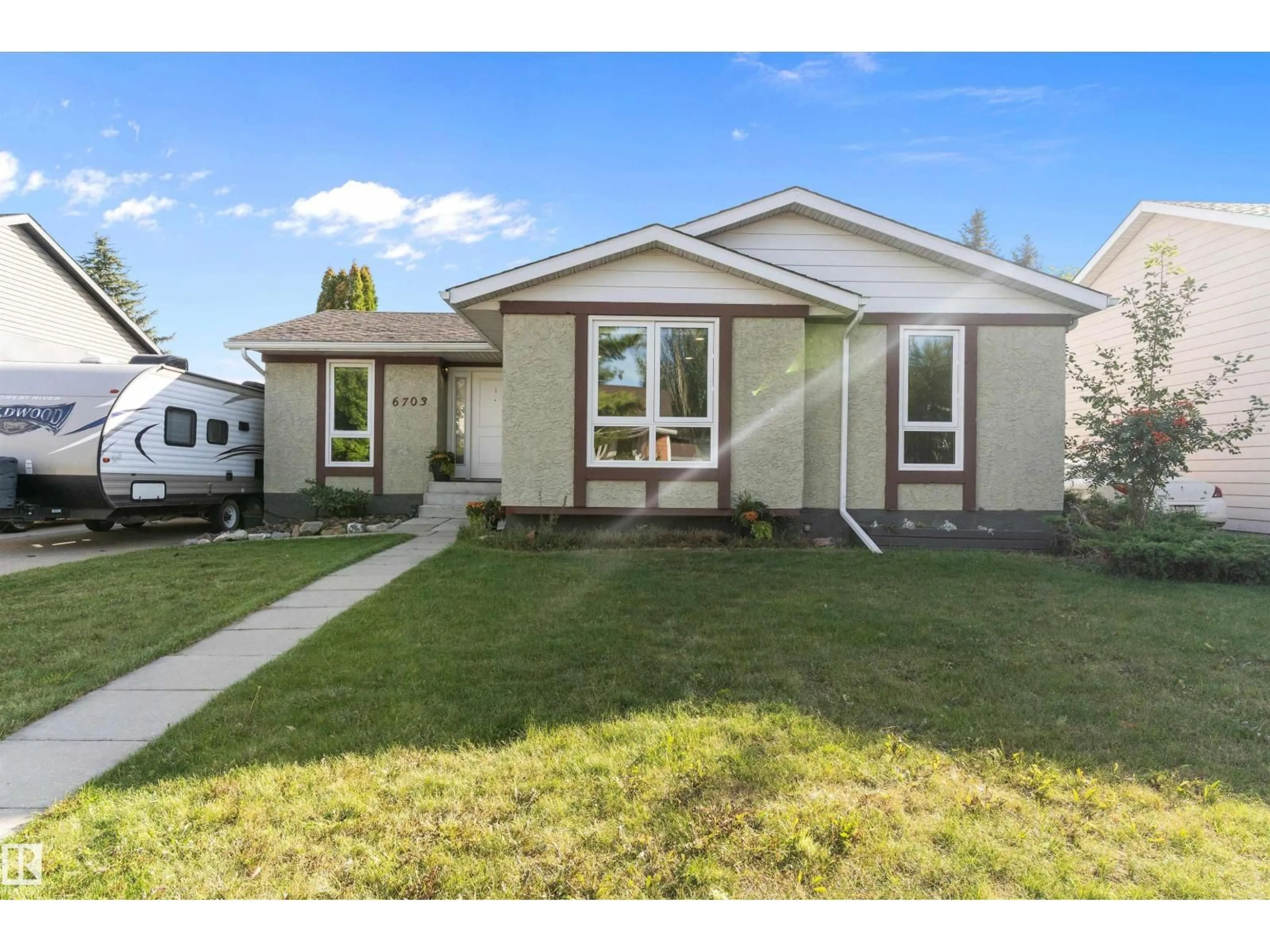 Home with vinyl exterior material, street for NW - 6703 182 ST, Edmonton Alberta T5T2C3