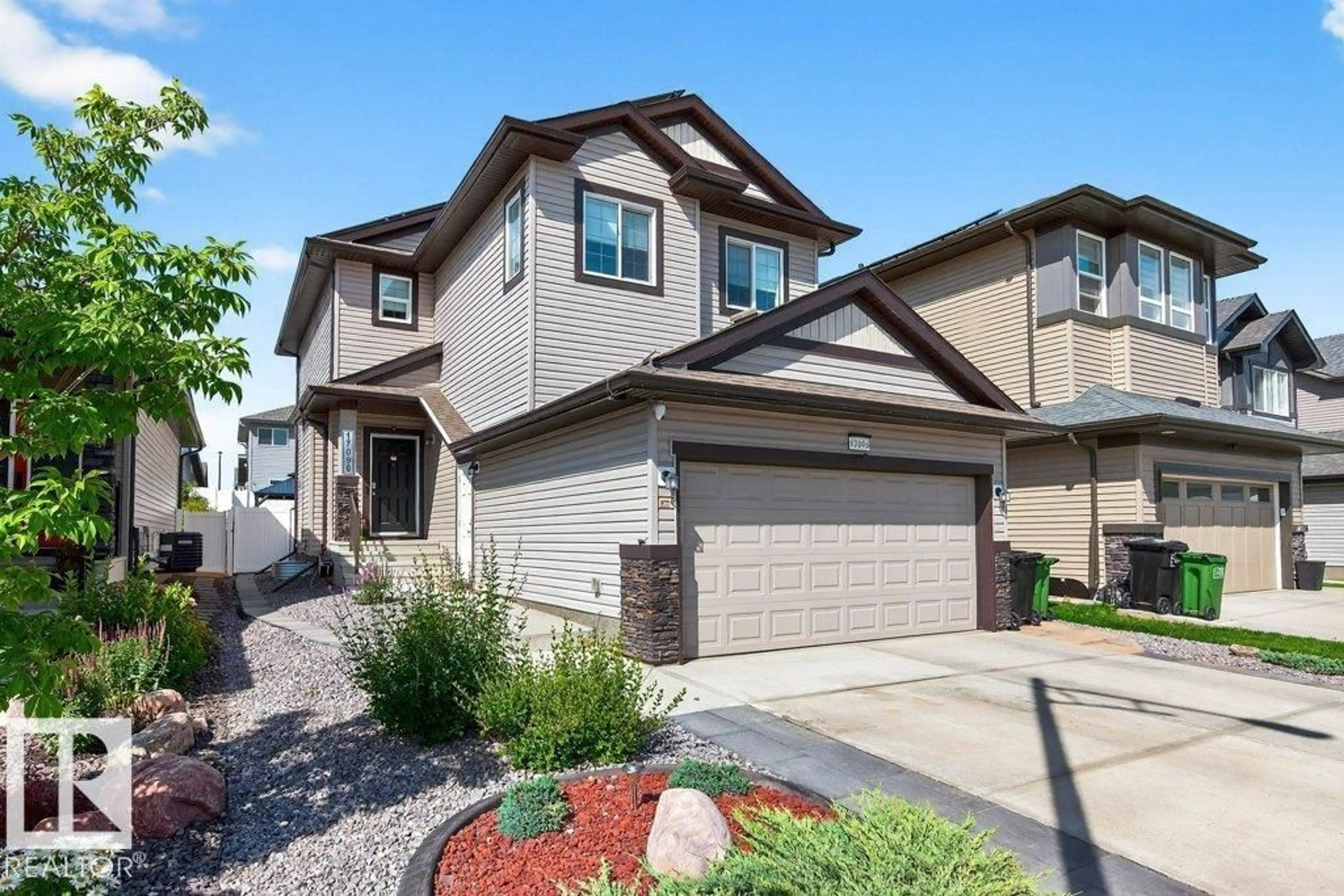 Home with vinyl exterior material, street for NW - 17096 46 ST, Edmonton Alberta T5Y4B1