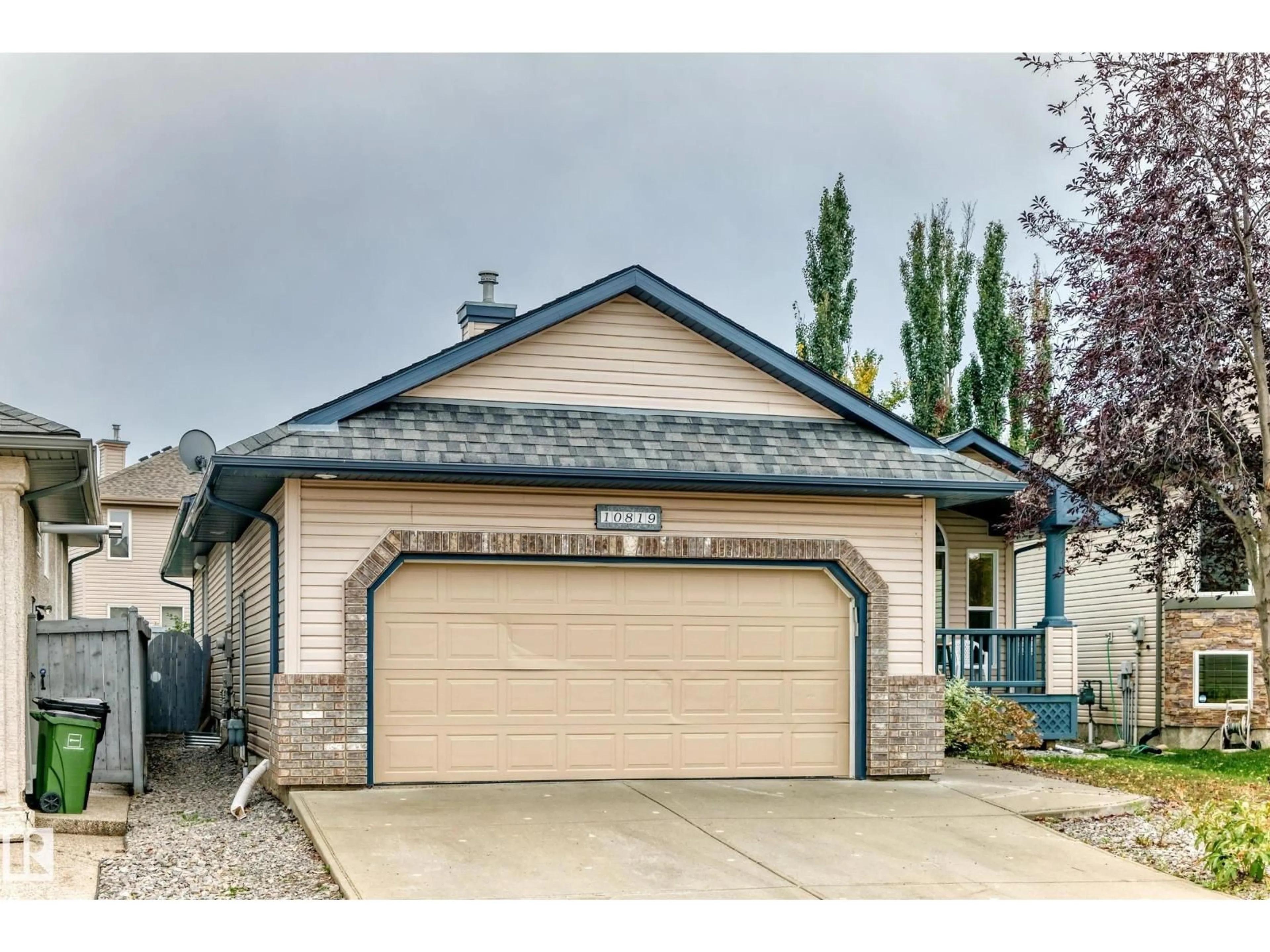 Home with vinyl exterior material, street for 10819 178 AV, Edmonton Alberta T5X6H6