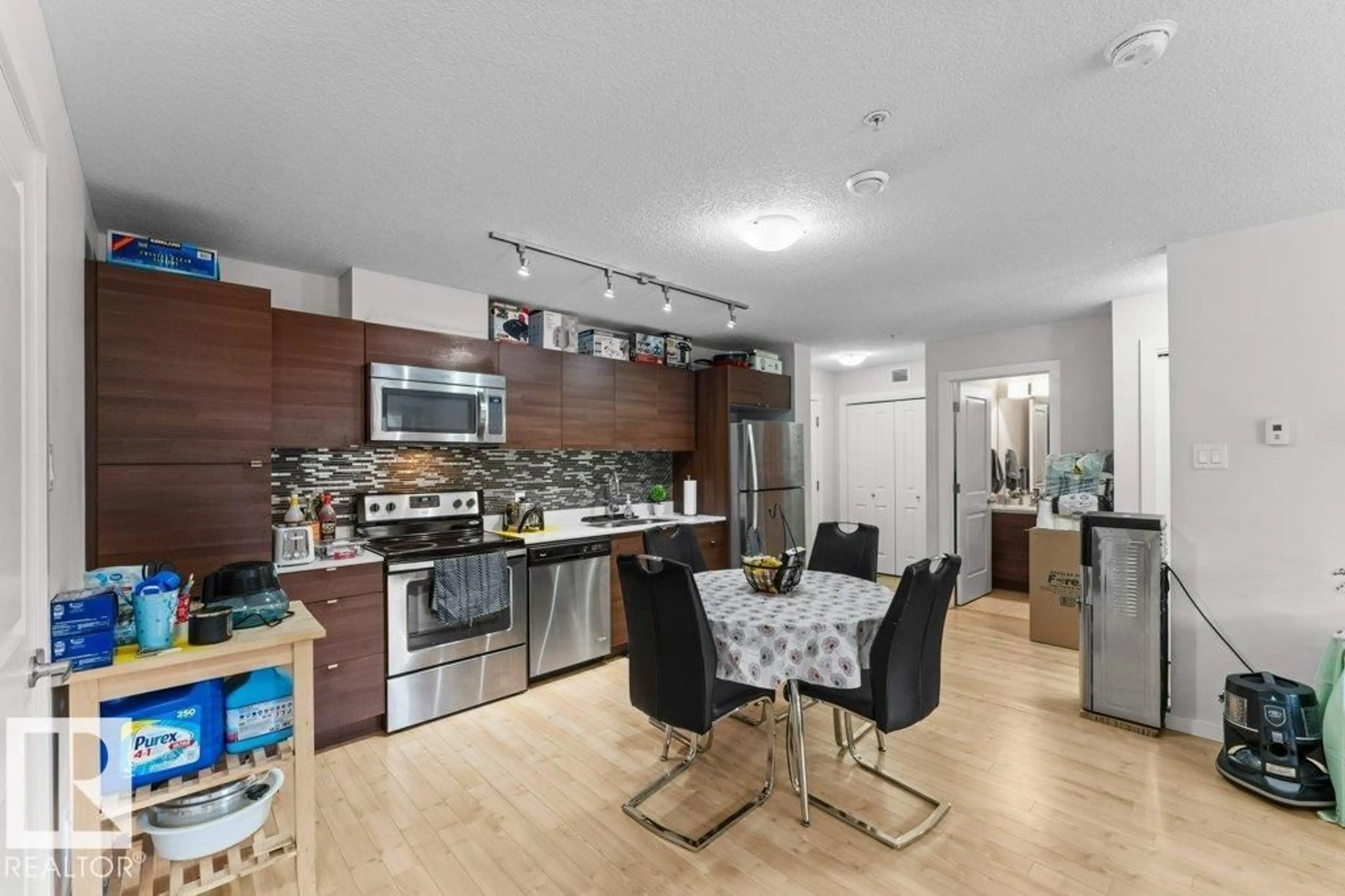 Open concept kitchen, unknown for #212 - 9517 160 AV, Edmonton Alberta T5Z0N1