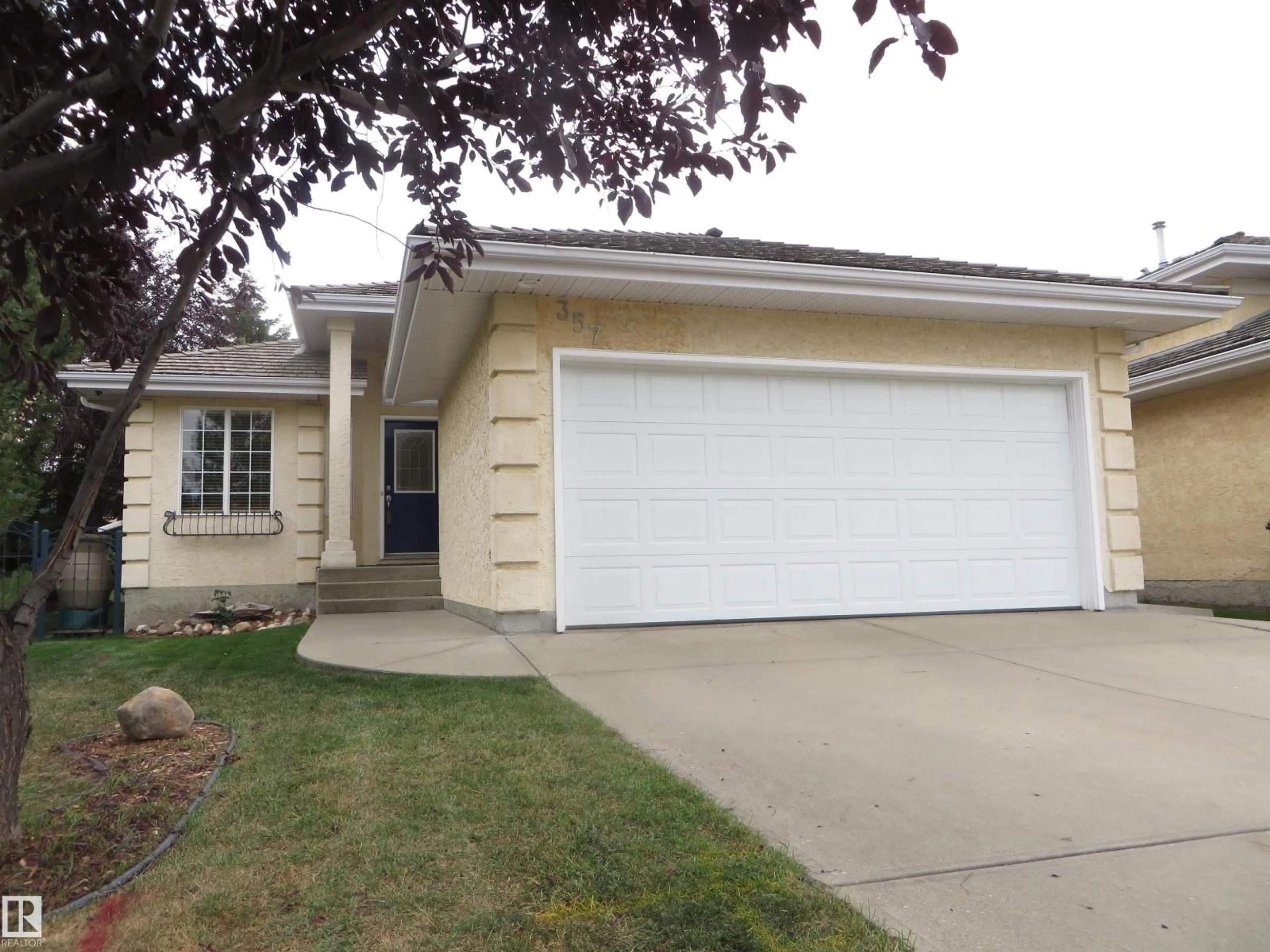 Home with vinyl exterior material, street for 357 BLACKBURN DR, Edmonton Alberta T6W1B8