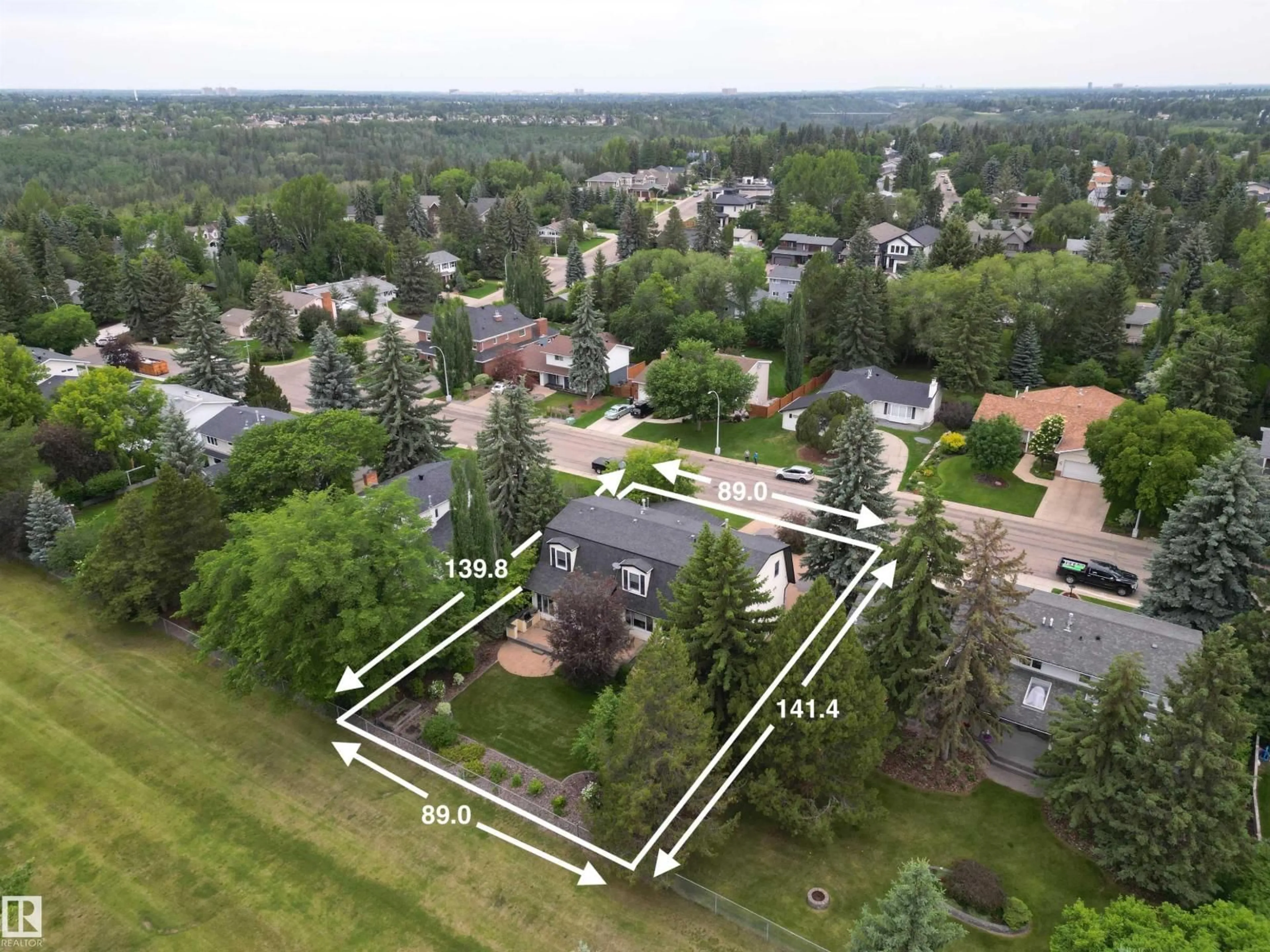 A pic from outside/outdoor area/front of a property/back of a property/a pic from drone, street for 63 FAIRWAY DR, Edmonton Alberta T6J2C2