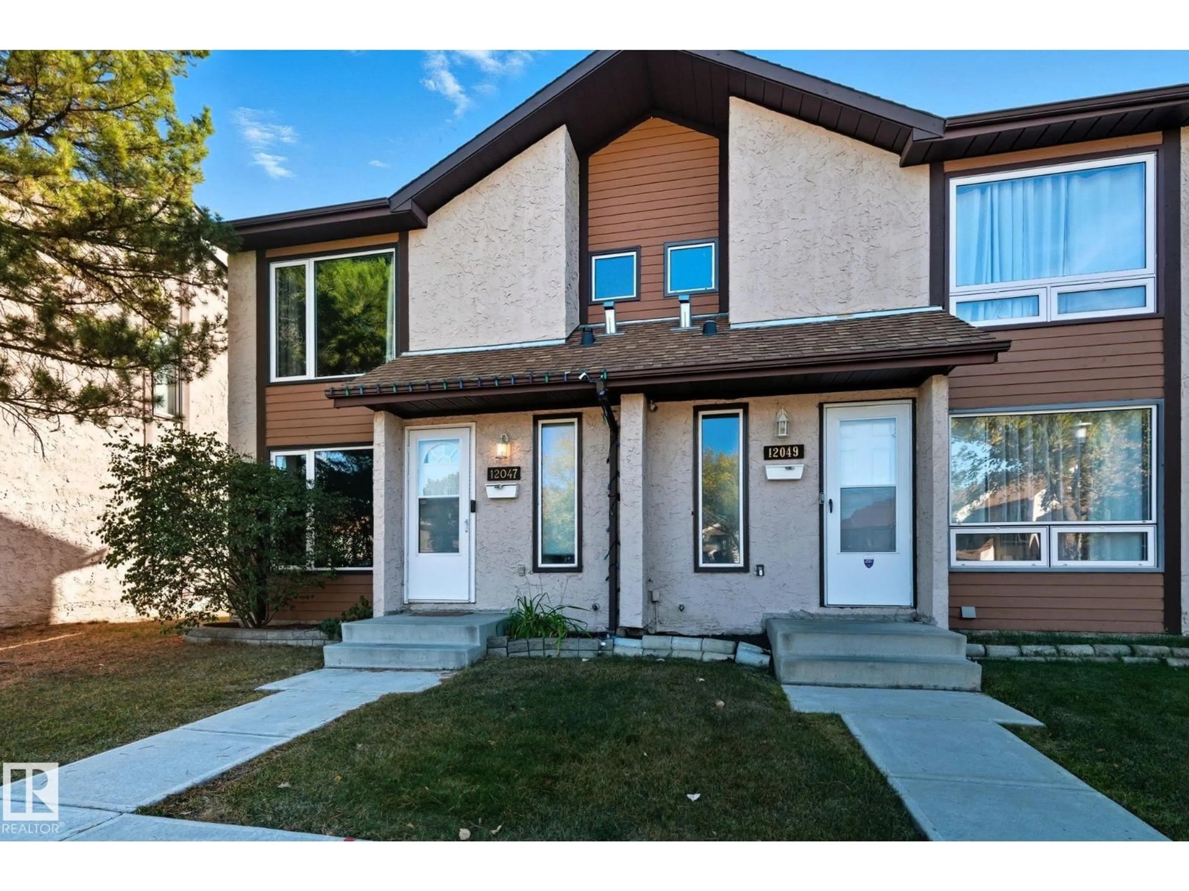 Home with brick exterior material, street for 12047 162 AV, Edmonton Alberta T5X3R1