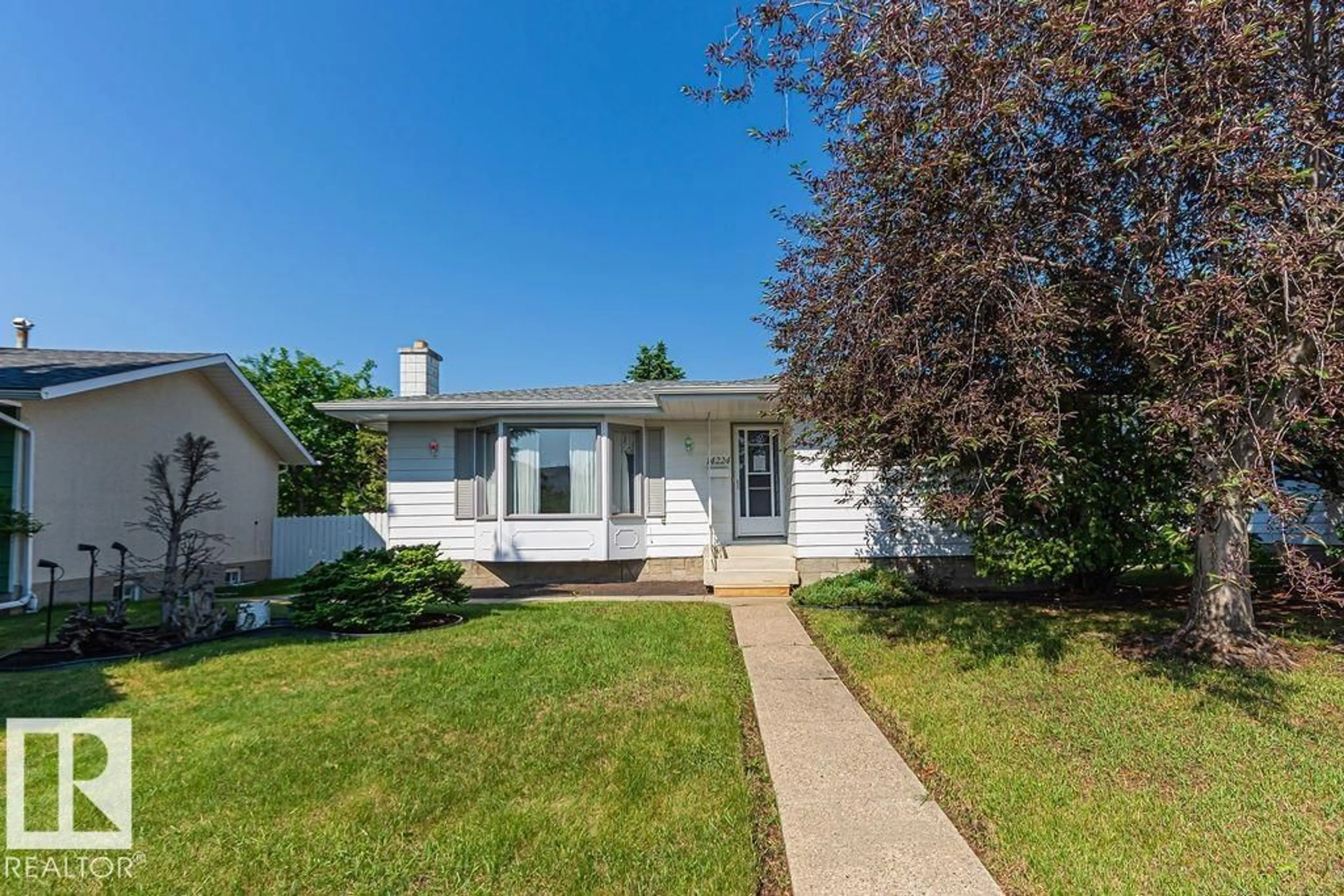 Home with vinyl exterior material, street for NW - 14224 78 ST, Edmonton Alberta T5C1H5