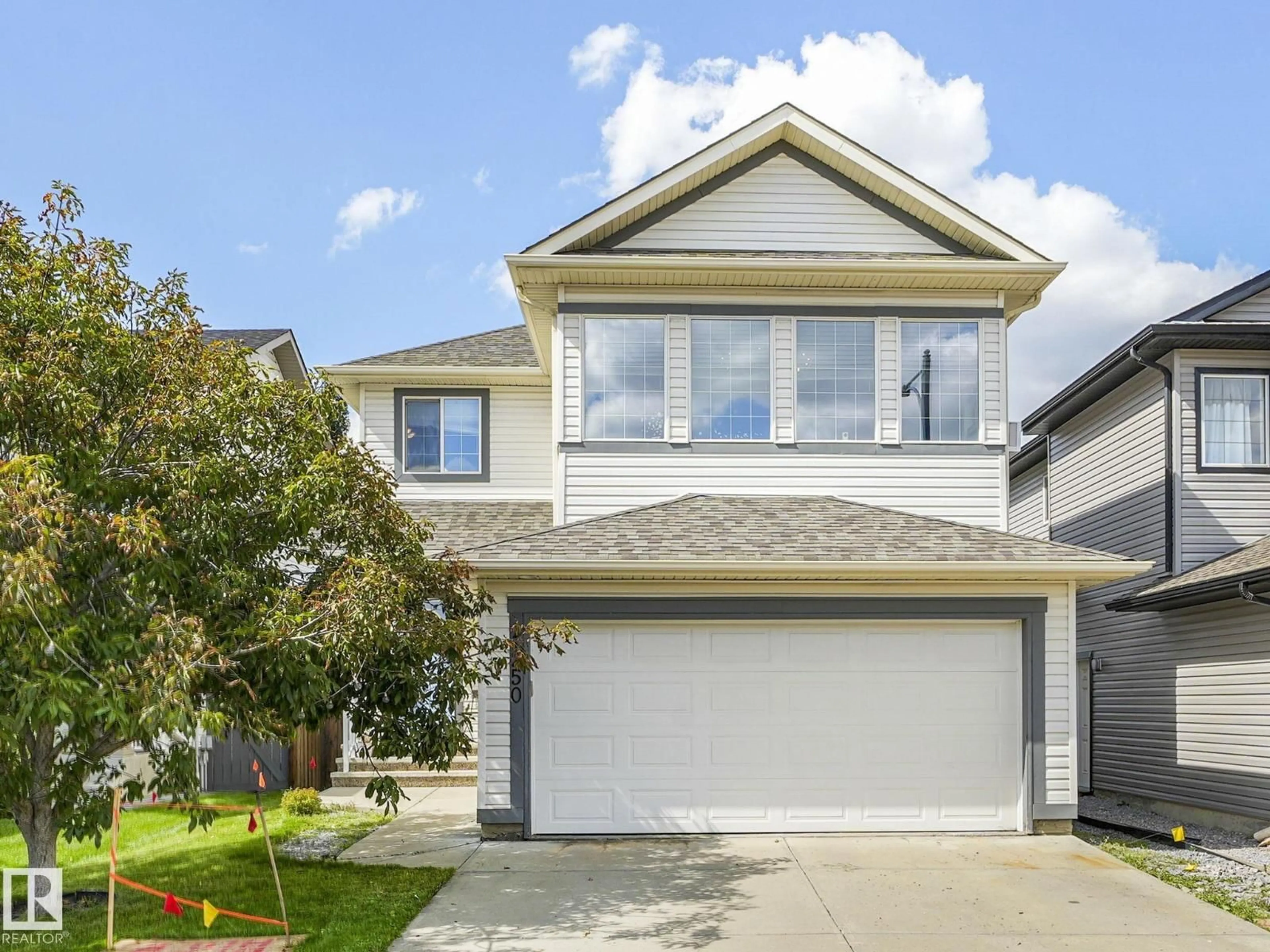 Home with vinyl exterior material, street for SW - 1250 MCALLISTER WY, Edmonton Alberta T6W1X7