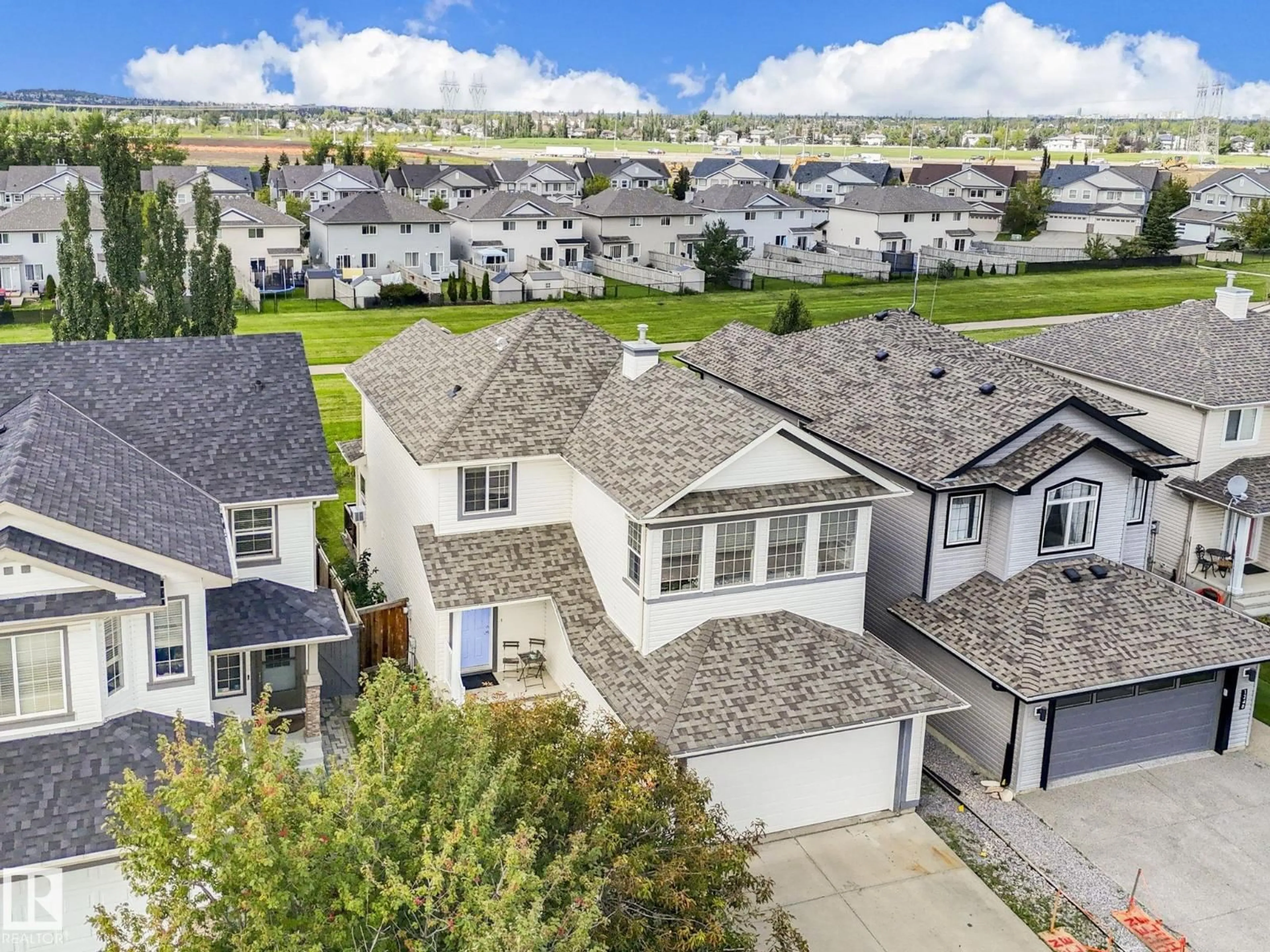 A pic from outside/outdoor area/front of a property/back of a property/a pic from drone, mountain view for SW - 1250 MCALLISTER WY, Edmonton Alberta T6W1X7