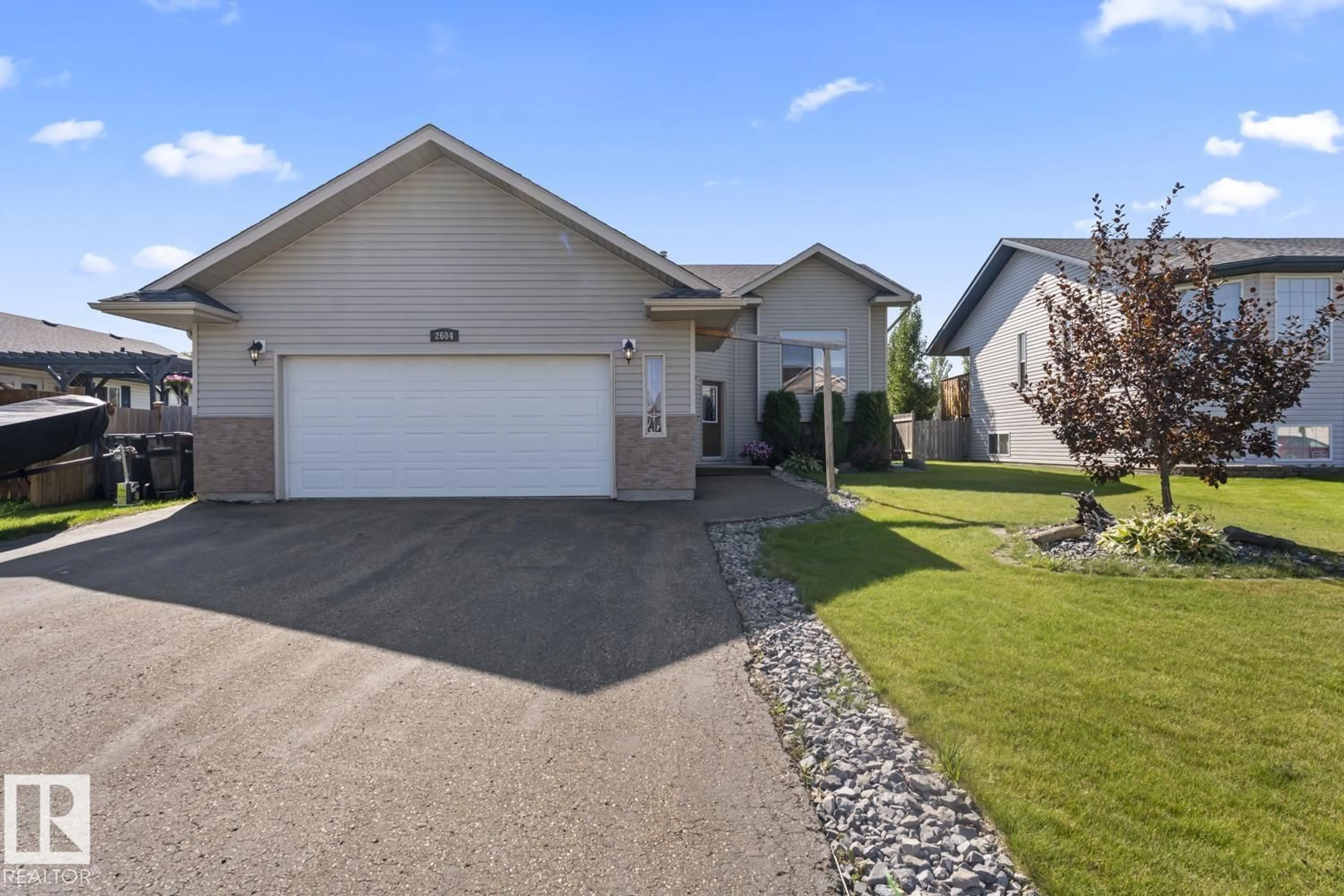 Home with vinyl exterior material, street for 2604 6A AV, Cold Lake Alberta T9M2C7