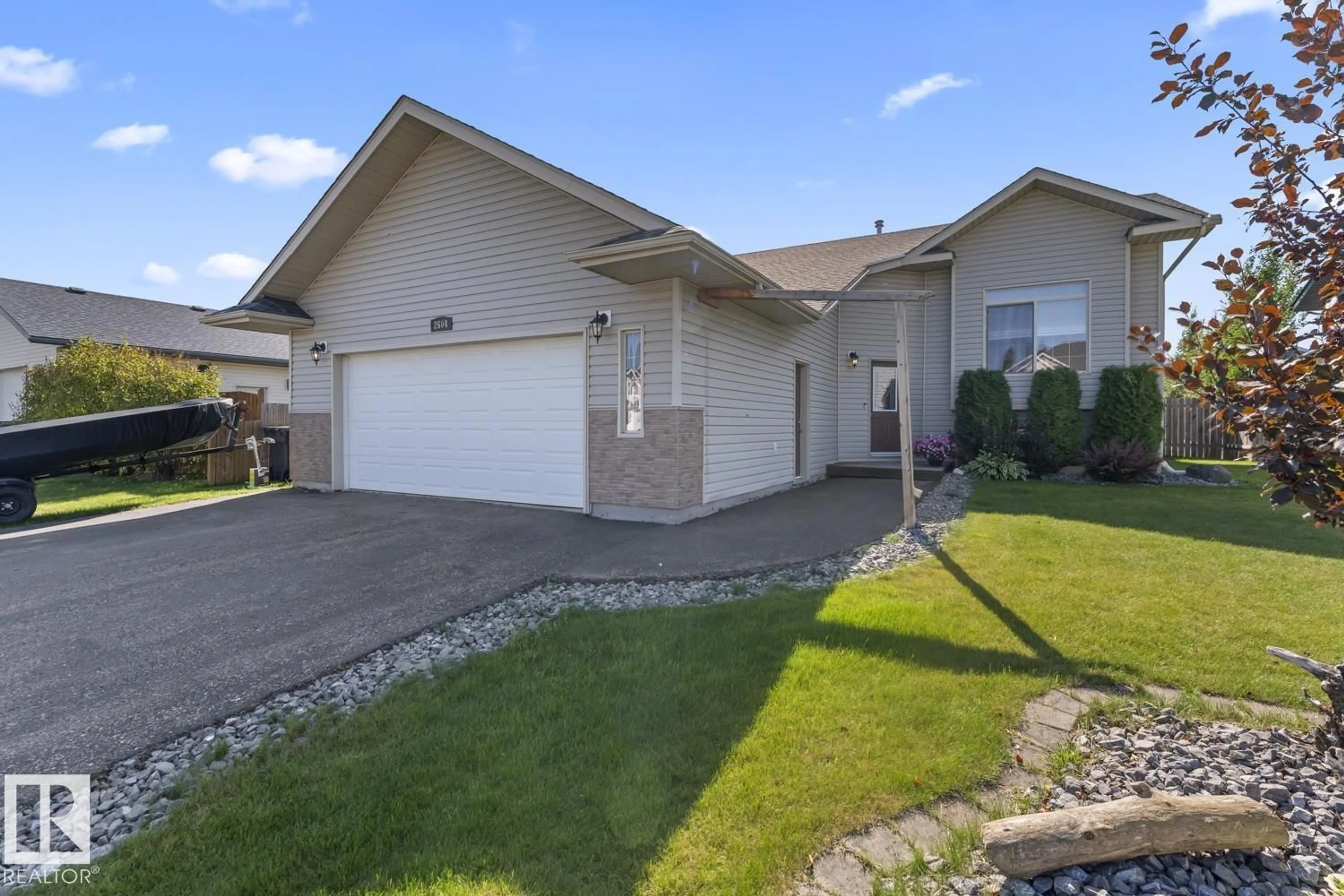 Home with vinyl exterior material, street for 2604 6A AV, Cold Lake Alberta T9M2C7