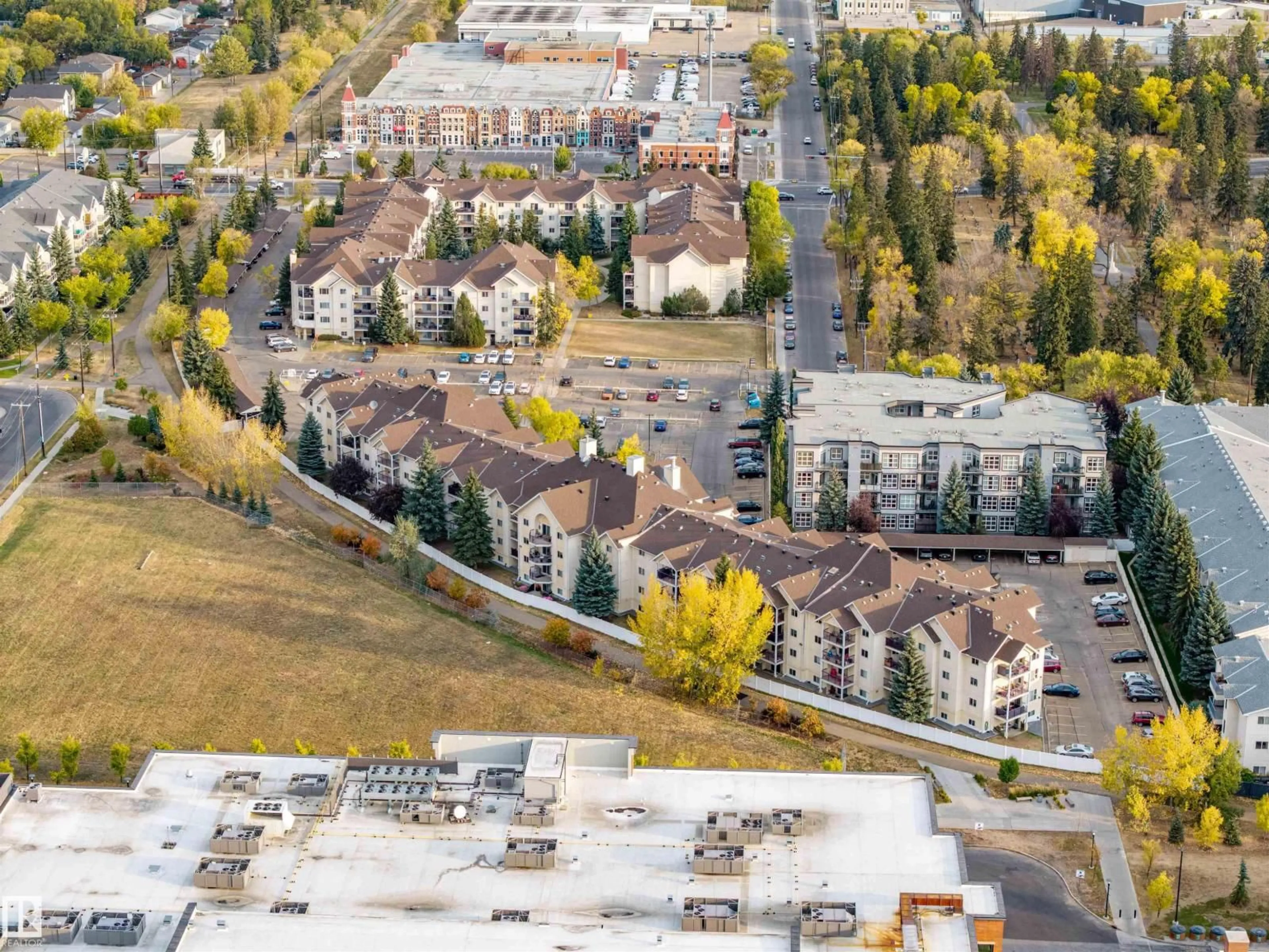 A pic from outside/outdoor area/front of a property/back of a property/a pic from drone, mountain view for 366 - 10520 120 ST, Edmonton Alberta T5H4L9