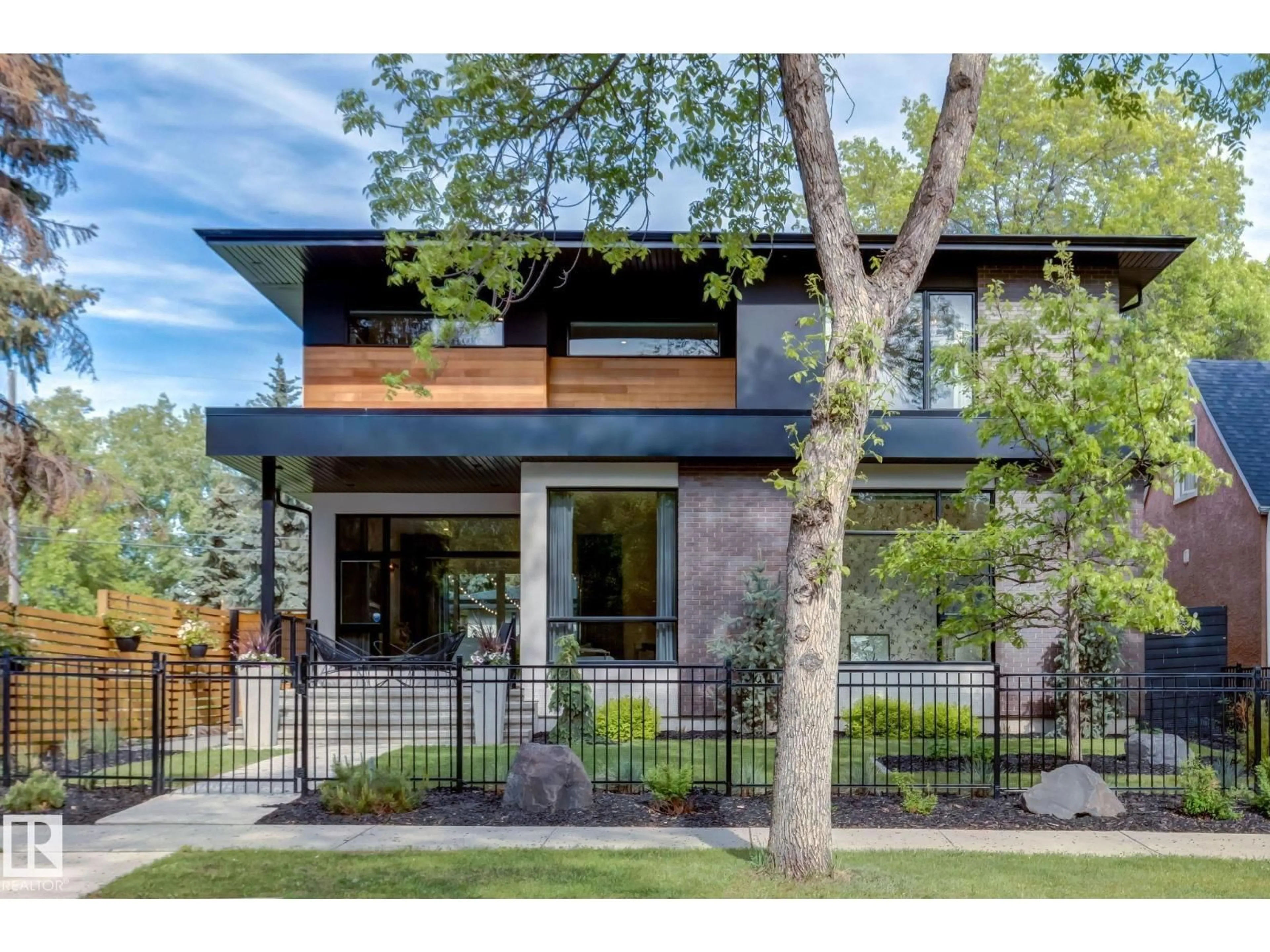 Home with brick exterior material, street for 10979 122 ST, Edmonton Alberta T5M0A9
