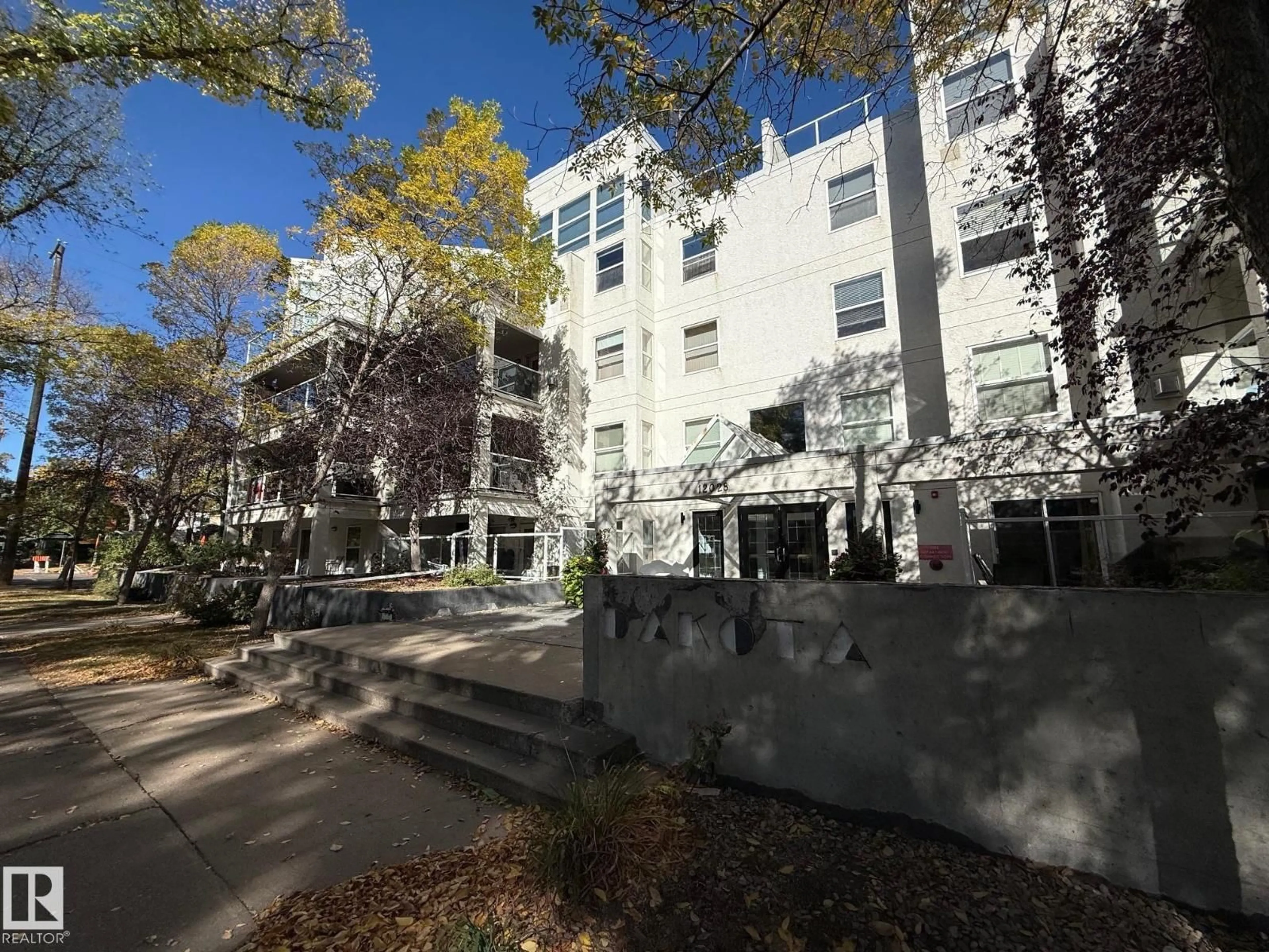 A pic from outside/outdoor area/front of a property/back of a property/a pic from drone, building for #404 - 12028 103 AV NW, Edmonton Alberta T5K2T9