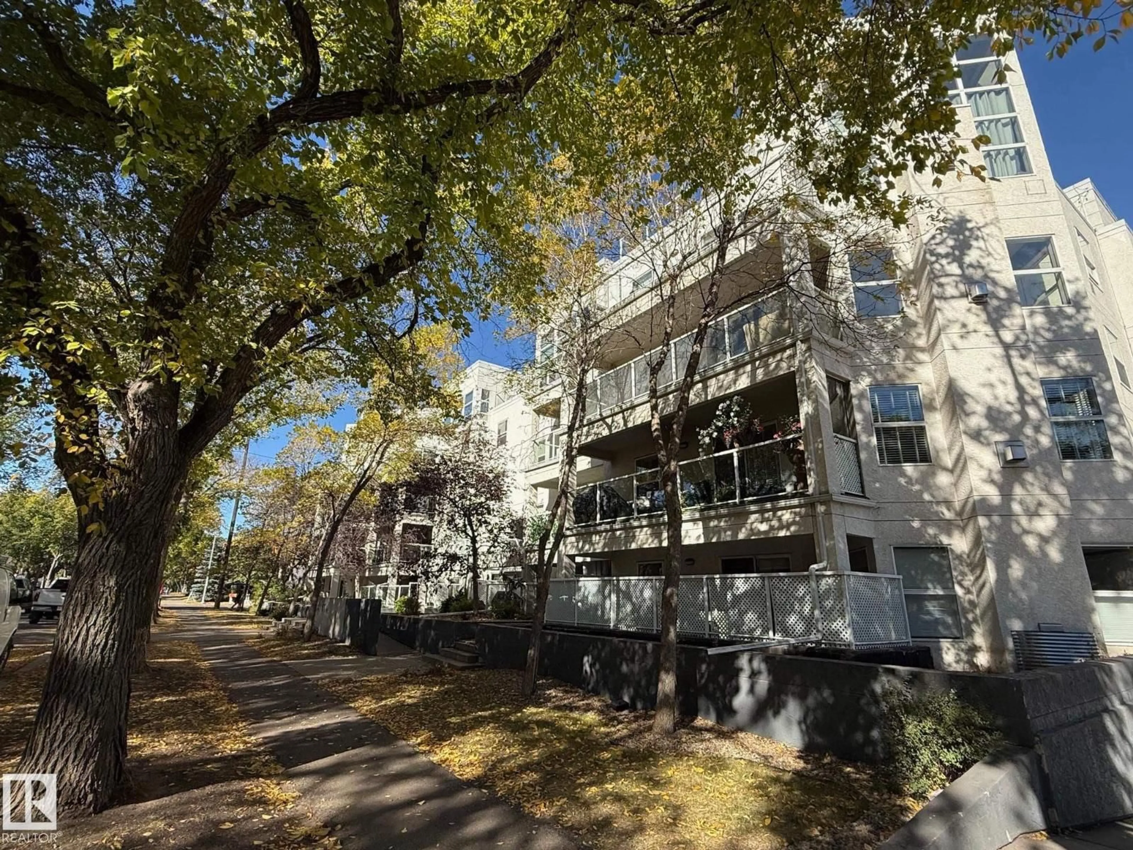 A pic from outside/outdoor area/front of a property/back of a property/a pic from drone, street for #404 - 12028 103 AV NW, Edmonton Alberta T5K2T9
