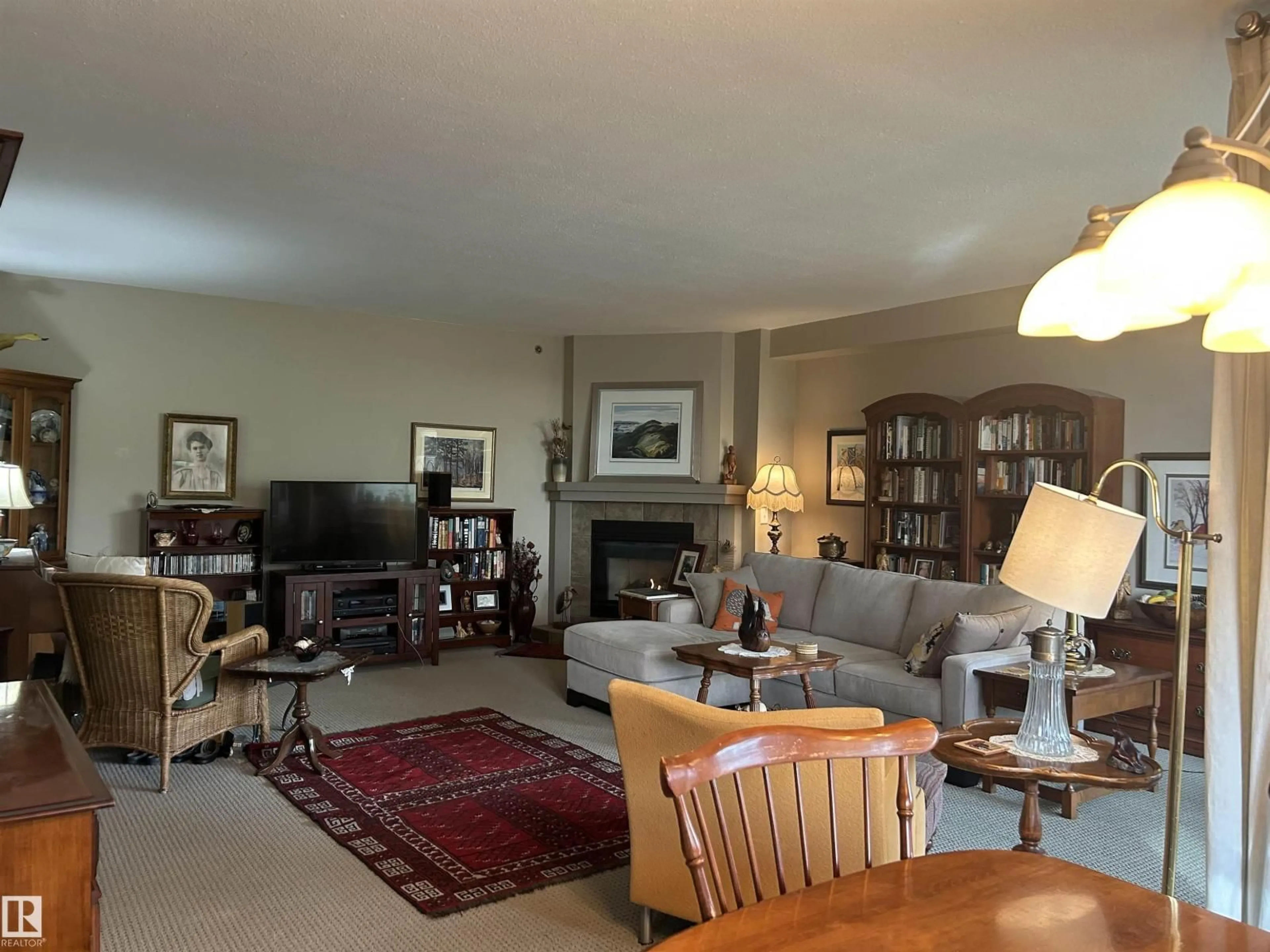 Living room with furniture, floor is not visible for #404 - 8728 GATEWAY BV, Edmonton Alberta T6E6K3