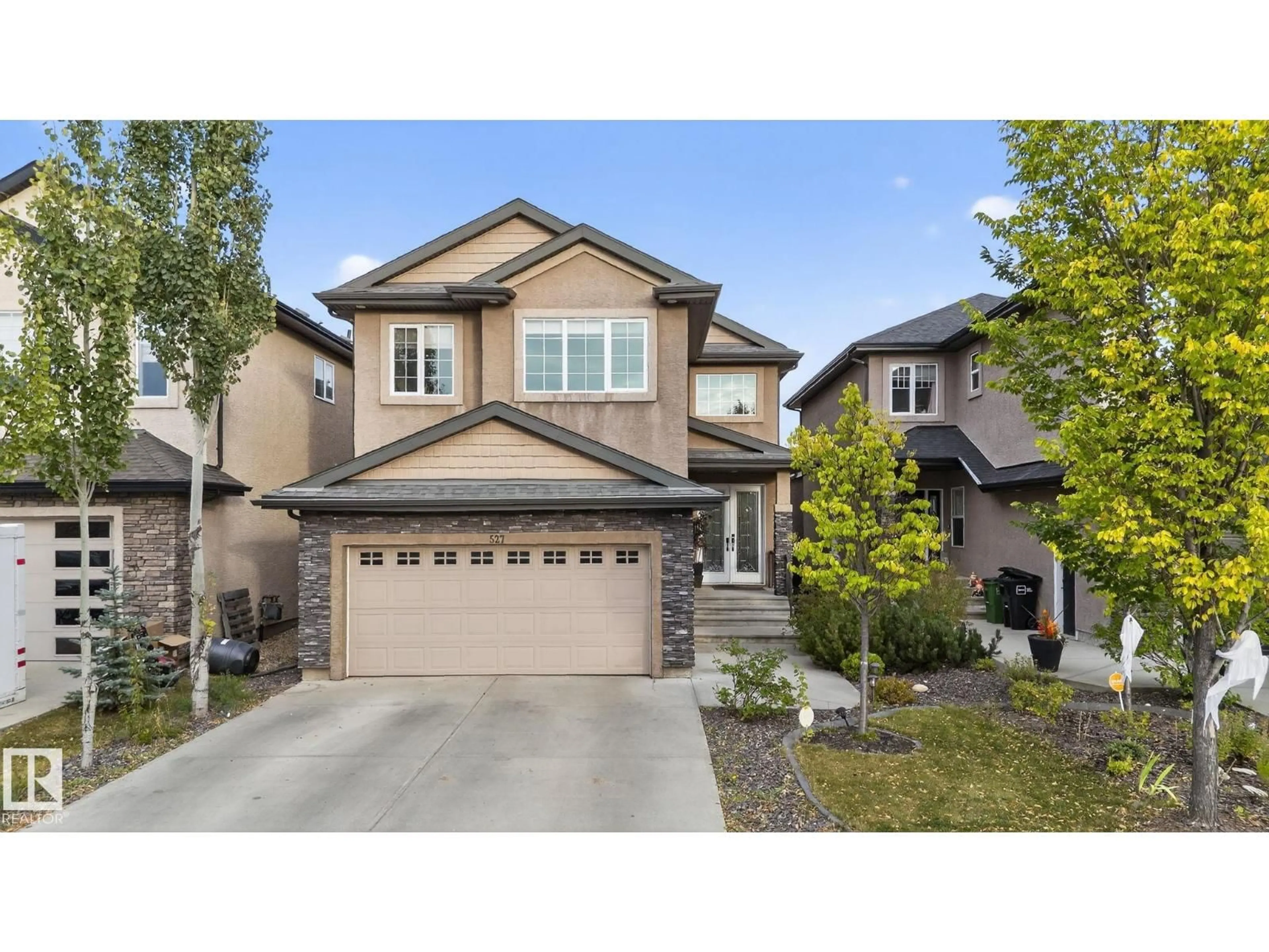 Home with vinyl exterior material, street for 527 ALBANY WY, Edmonton Alberta T6V0H9