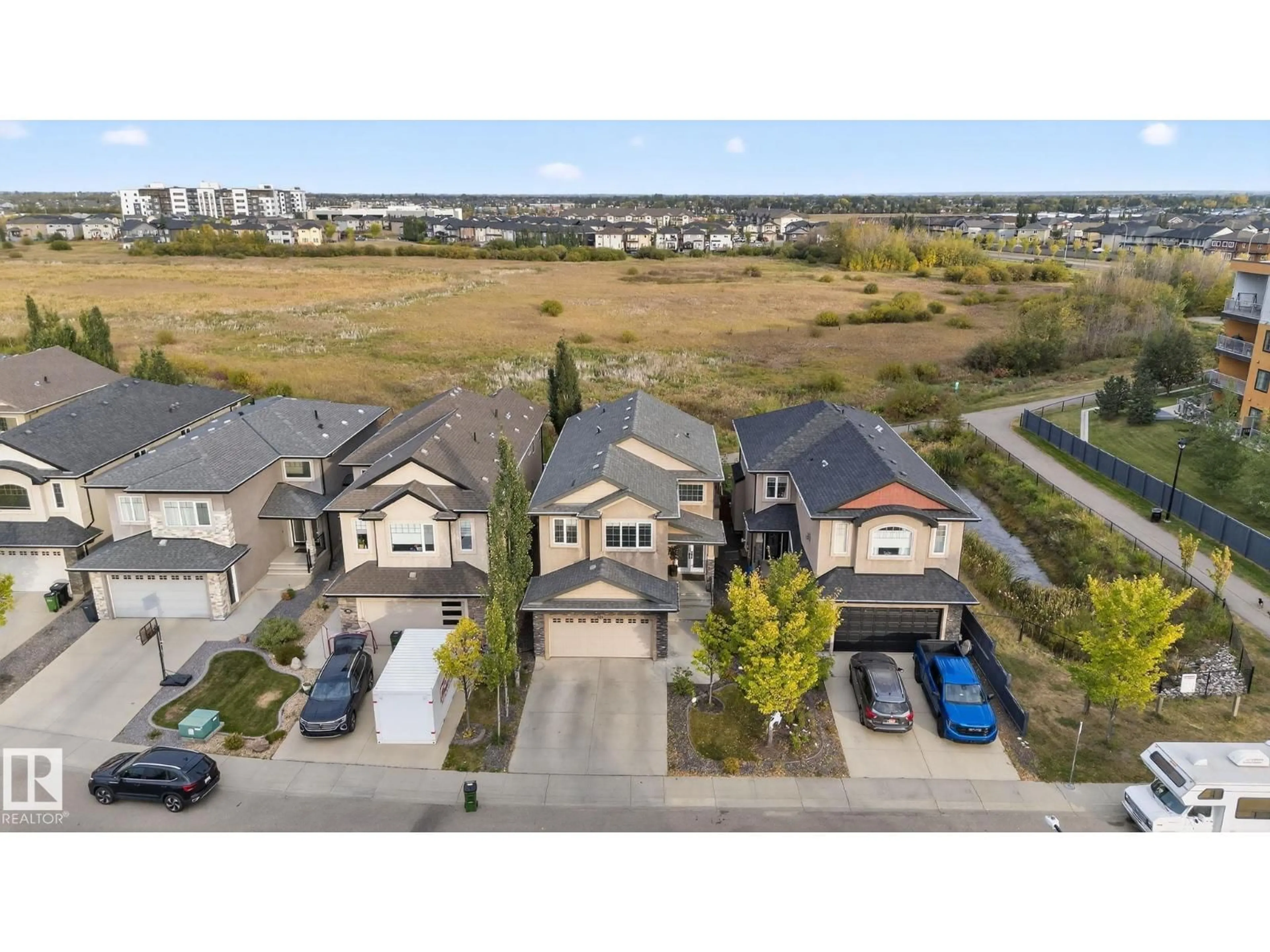 A pic from outside/outdoor area/front of a property/back of a property/a pic from drone, street for 527 ALBANY WY, Edmonton Alberta T6V0H9