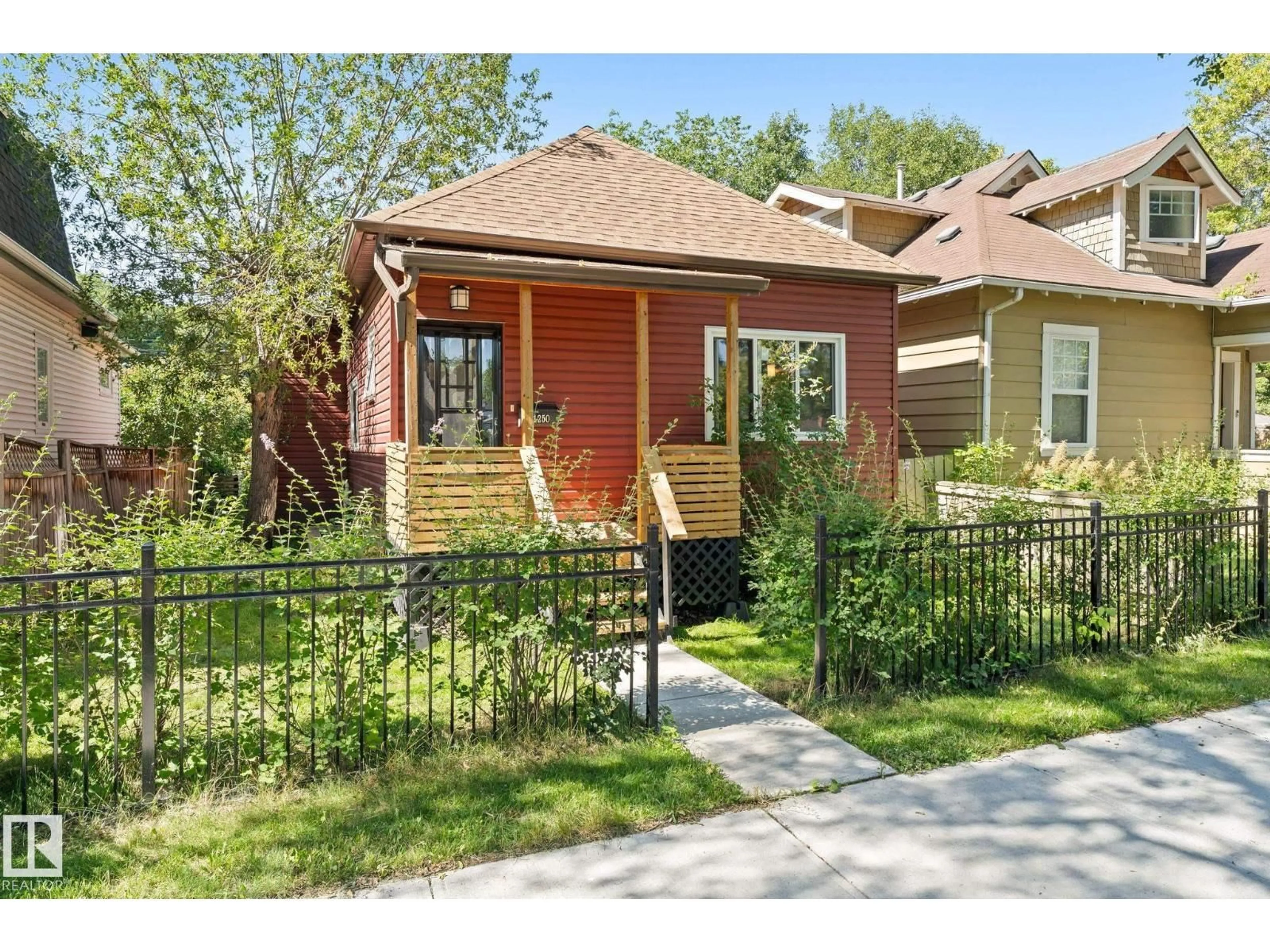Home with brick exterior material, street for 11250 92 ST, Edmonton Alberta T5G0Z1