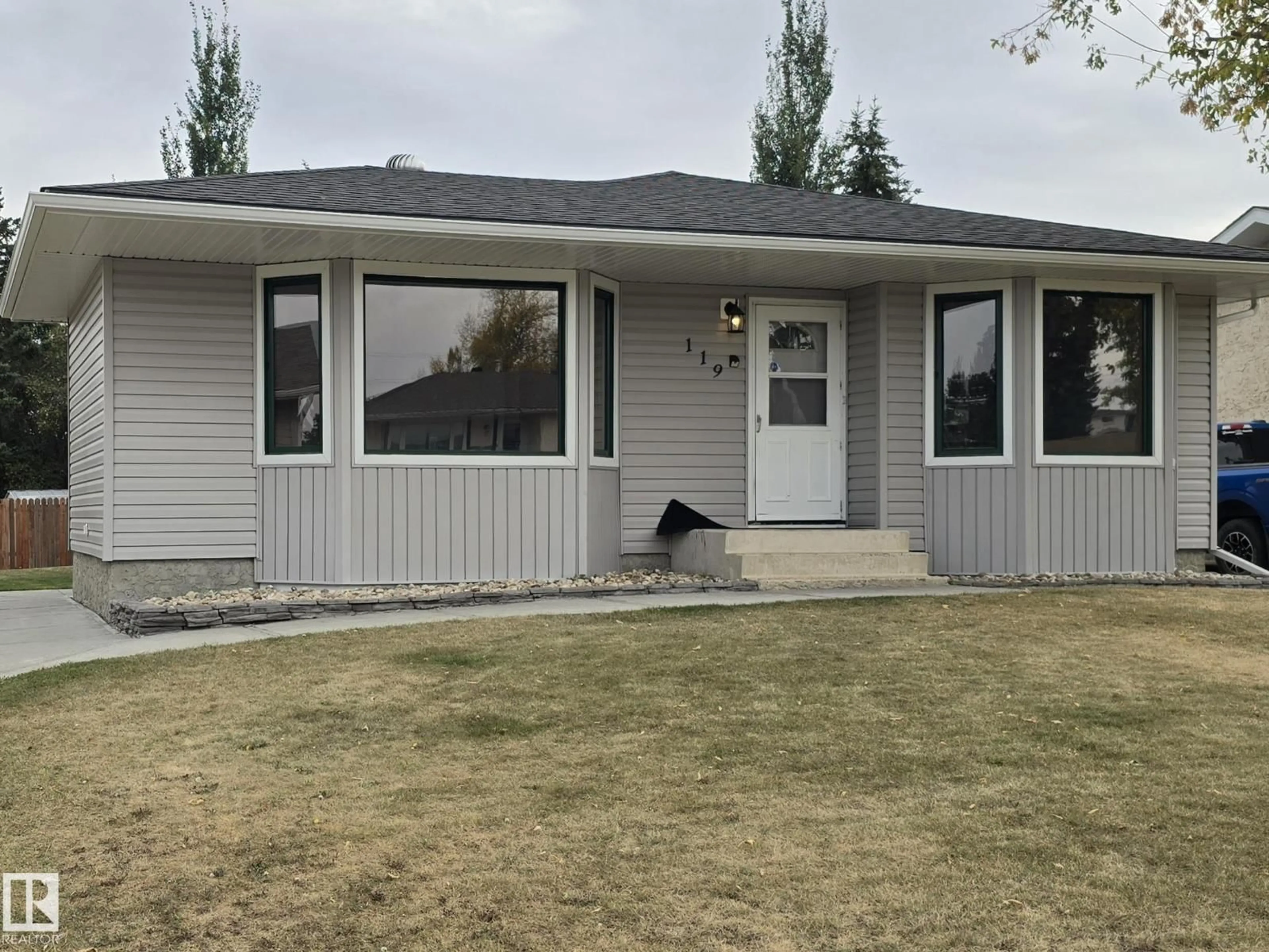 Home with vinyl exterior material, street for 119 DIAMOND DR, Millet Alberta T0C1Z0