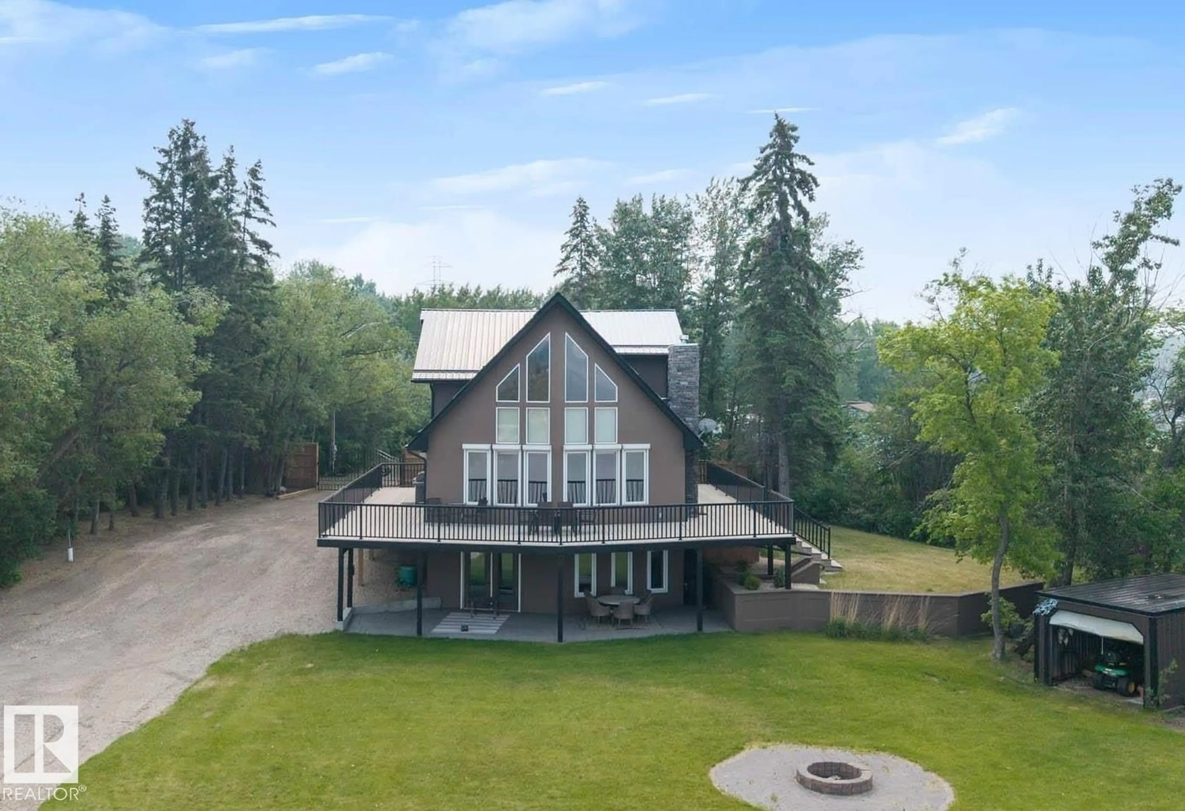 A pic from outside/outdoor area/front of a property/back of a property/a pic from drone, water/lake/river/ocean view for 47 RAILWAY AV, Rural Parkland County Alberta T0E2Y0
