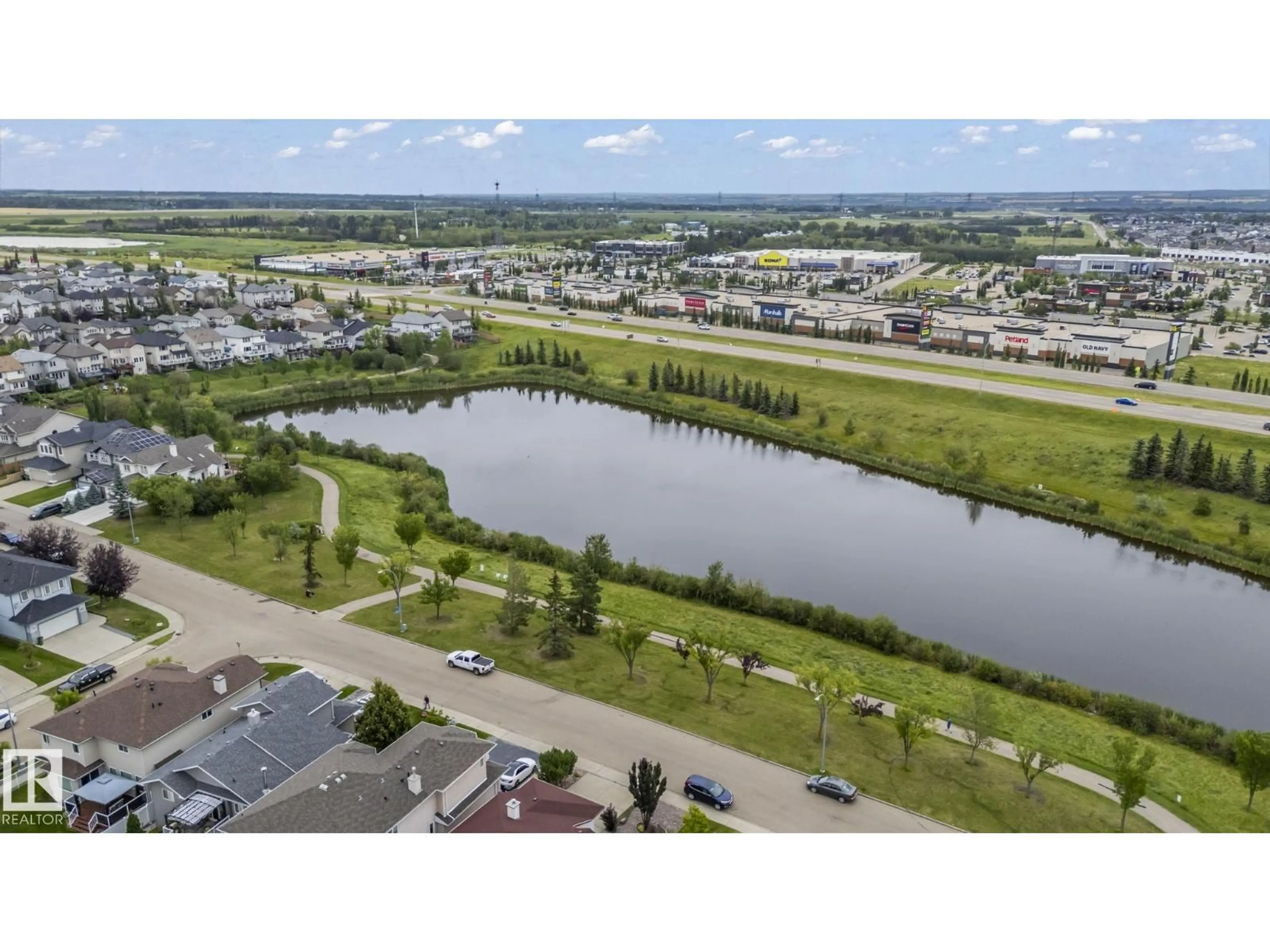 A pic from outside/outdoor area/front of a property/back of a property/a pic from drone, water/lake/river/ocean view for NW - 4308 155 AV, Edmonton Alberta T5Y3G9