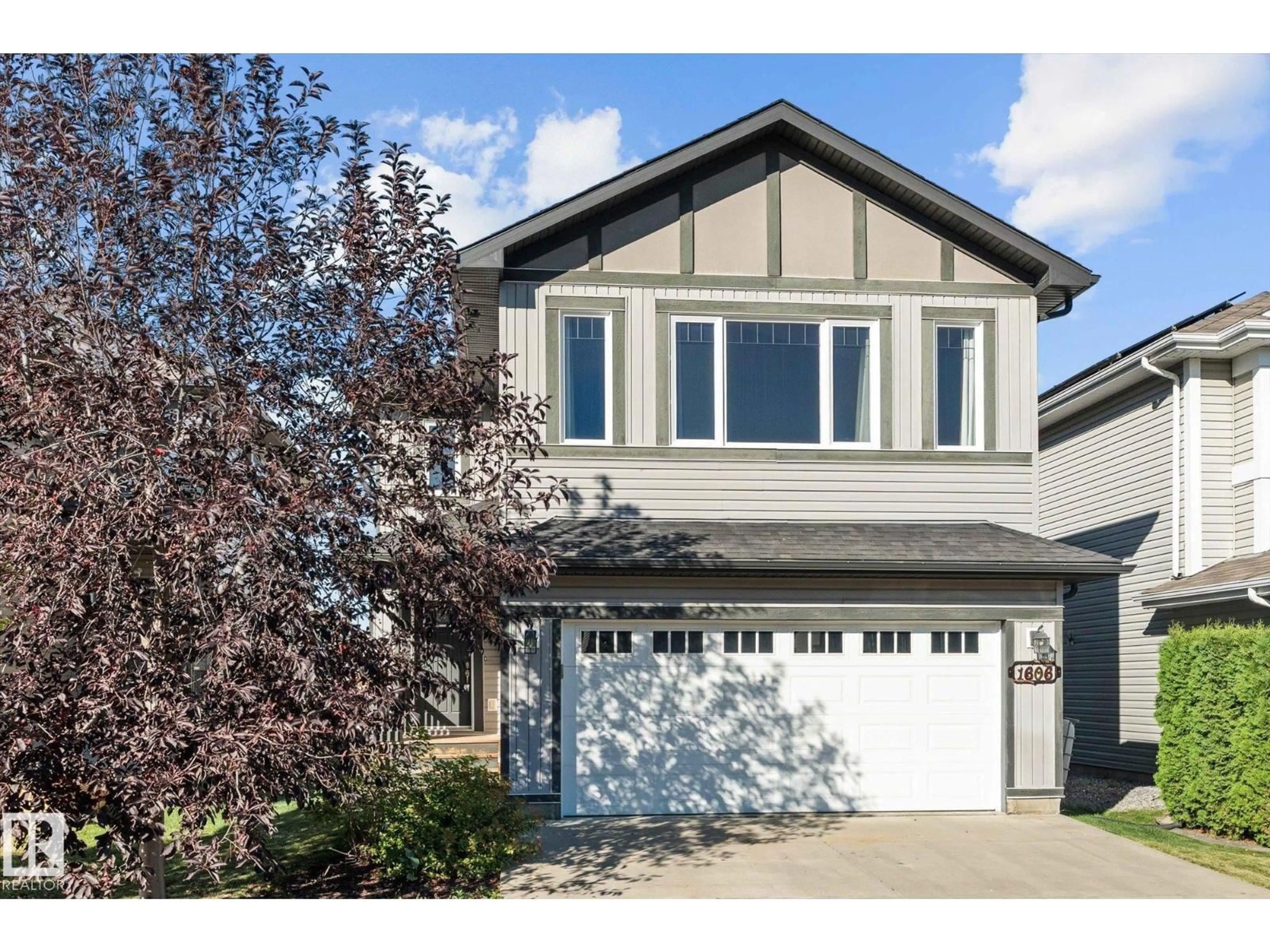 Home with vinyl exterior material, street for 1606 WESTERRA AV, Stony Plain Alberta T7X0H2