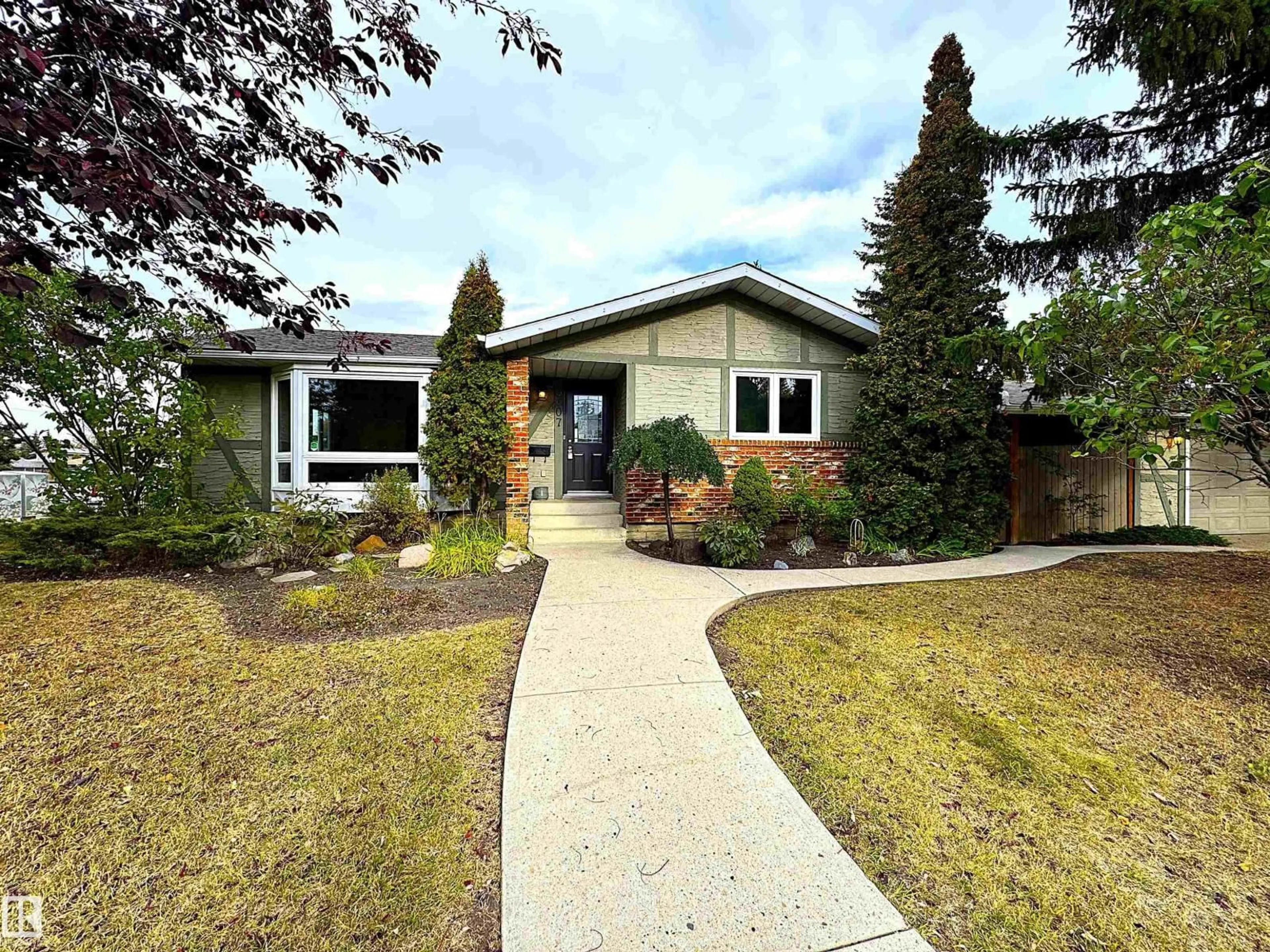Home with vinyl exterior material, street for NW - 3607 104 ST, Edmonton Alberta T6J2J8